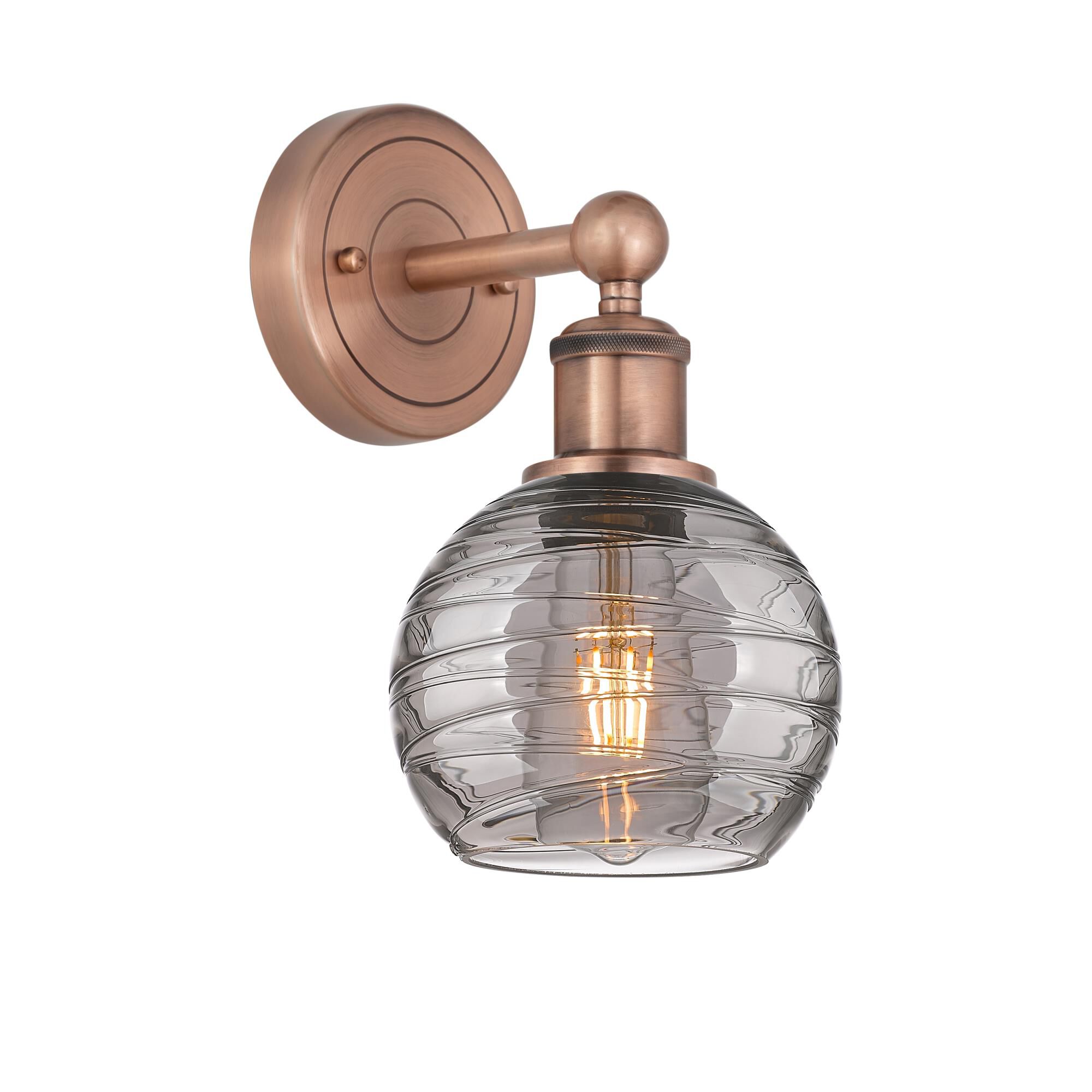 Shown in Antique Copper finish and Light Smoke Deco Swirl glass