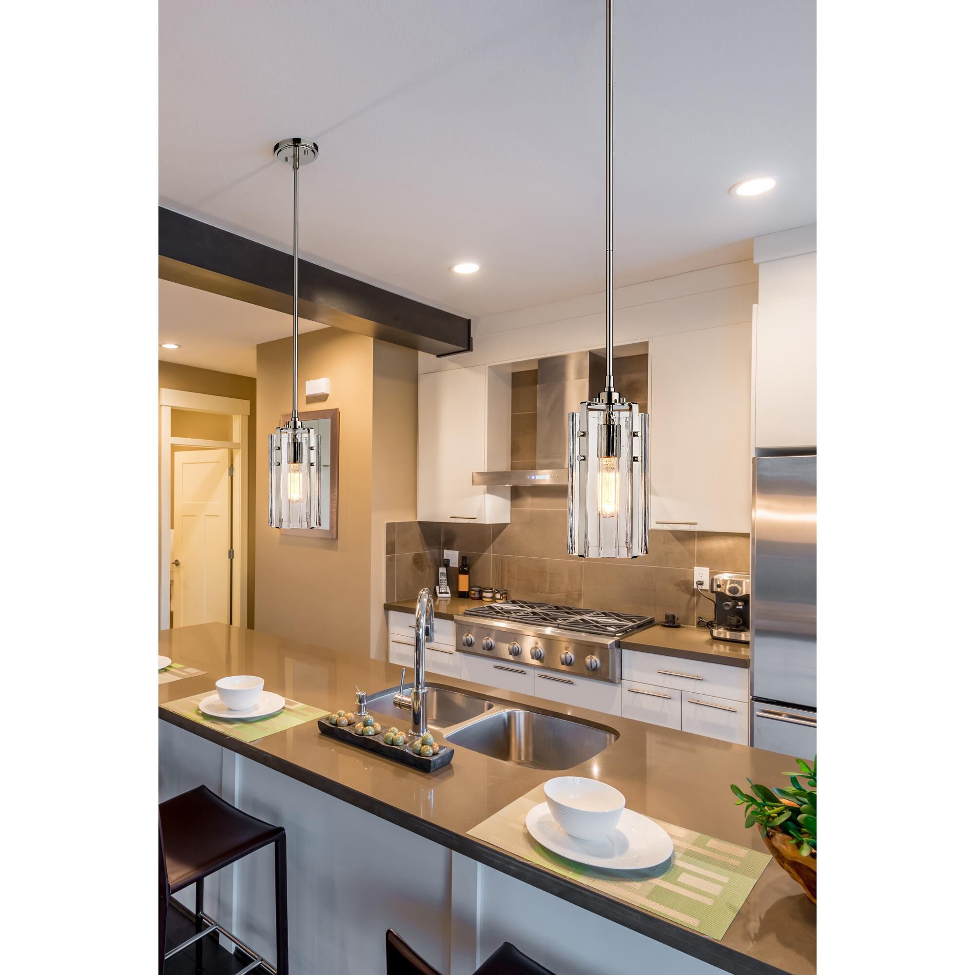 Shown in Polished Nickel finish and Clear glass and Clear shade