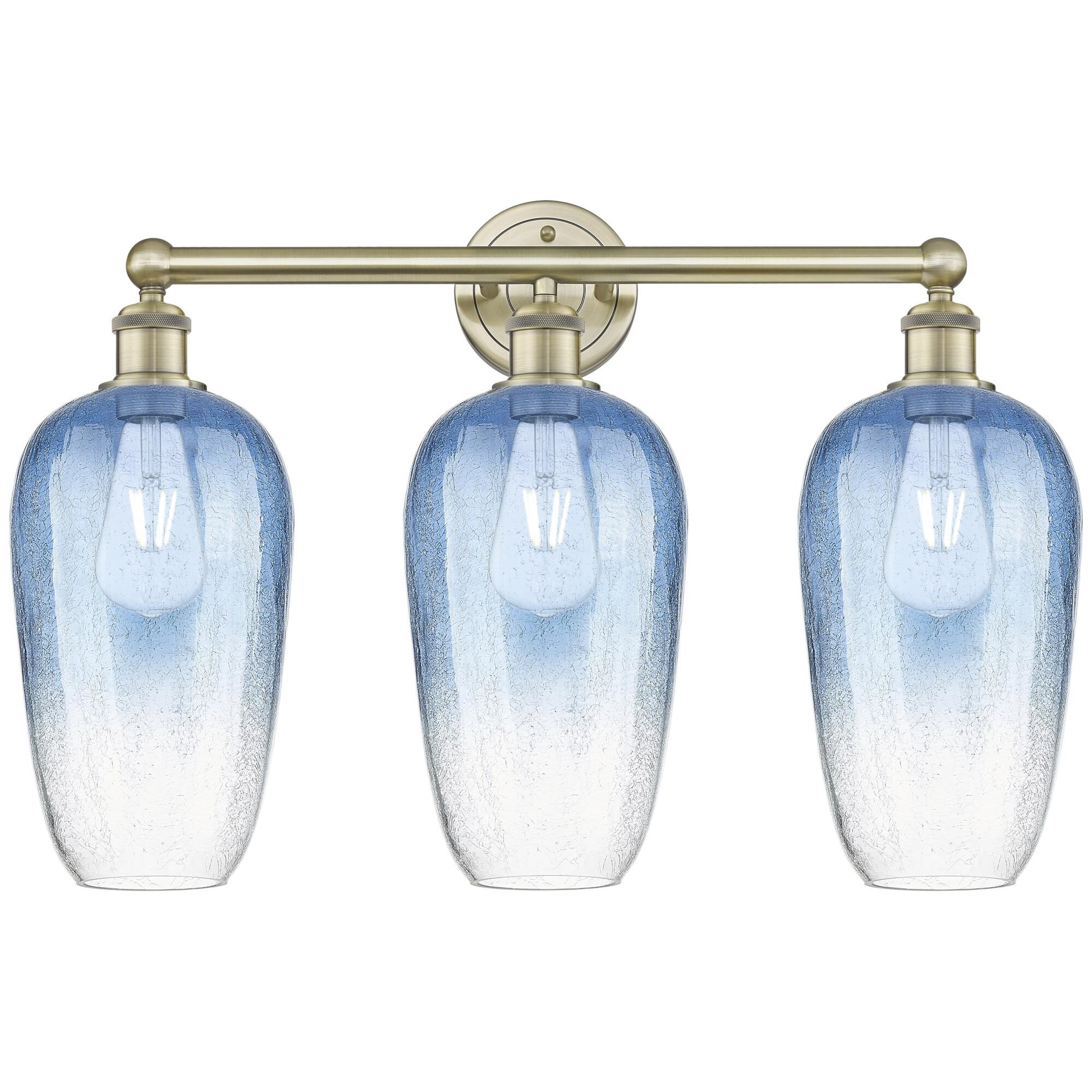 Shown in Antique Brass finish and Sapphire Blue glass