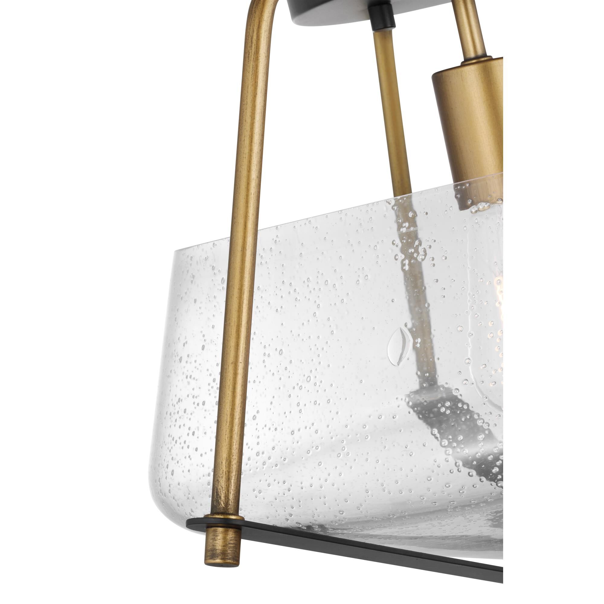 Shown in Matte Black and Natural Brass finish and Clear Seeded glass