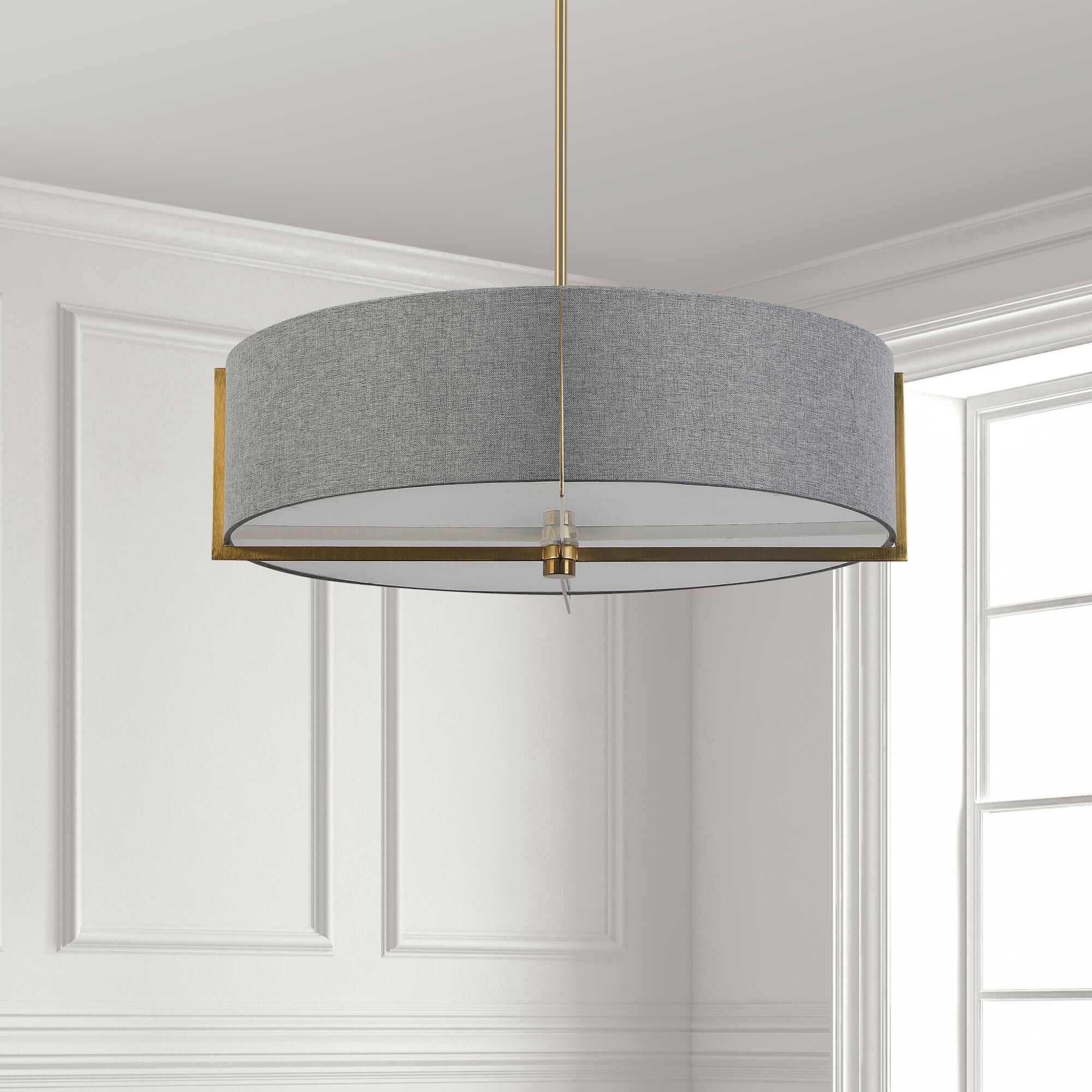Shown in Grey and Aged Brass finish and Fabric Gray Drum shade