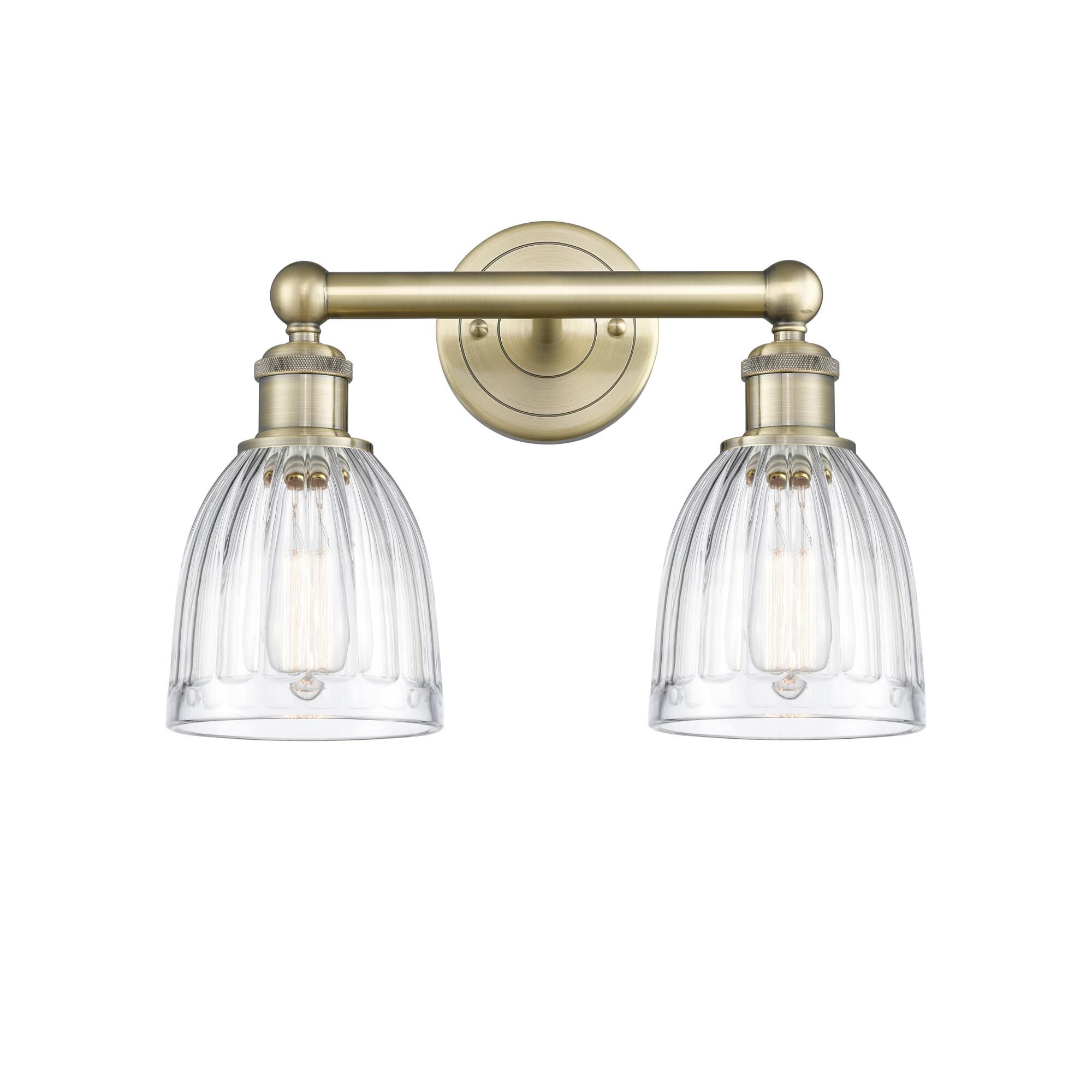 Shown in Antique Brass finish and Clear glass