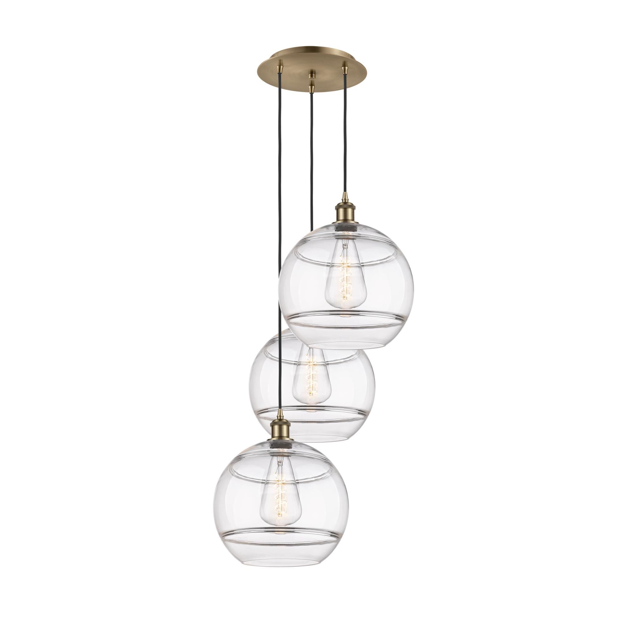 Shown in Antique Brass finish and Clear glass