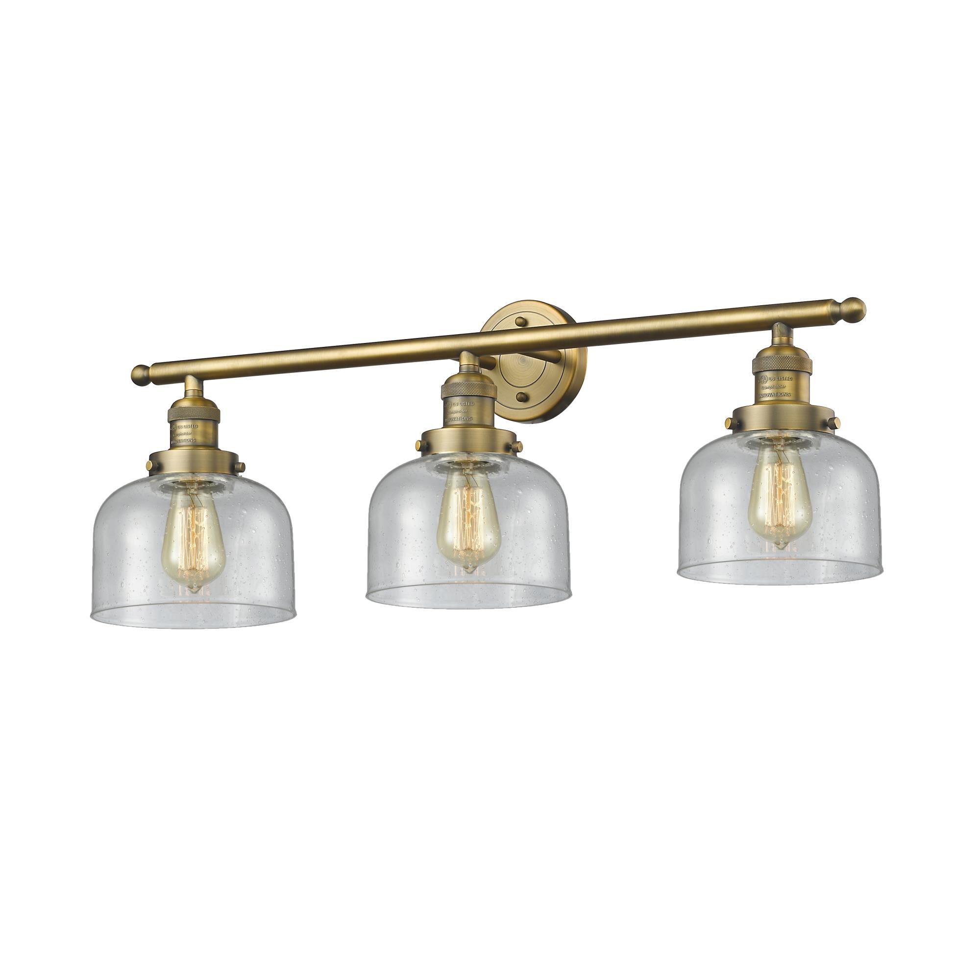 Shown in Brushed Brass finish and Seedy glass