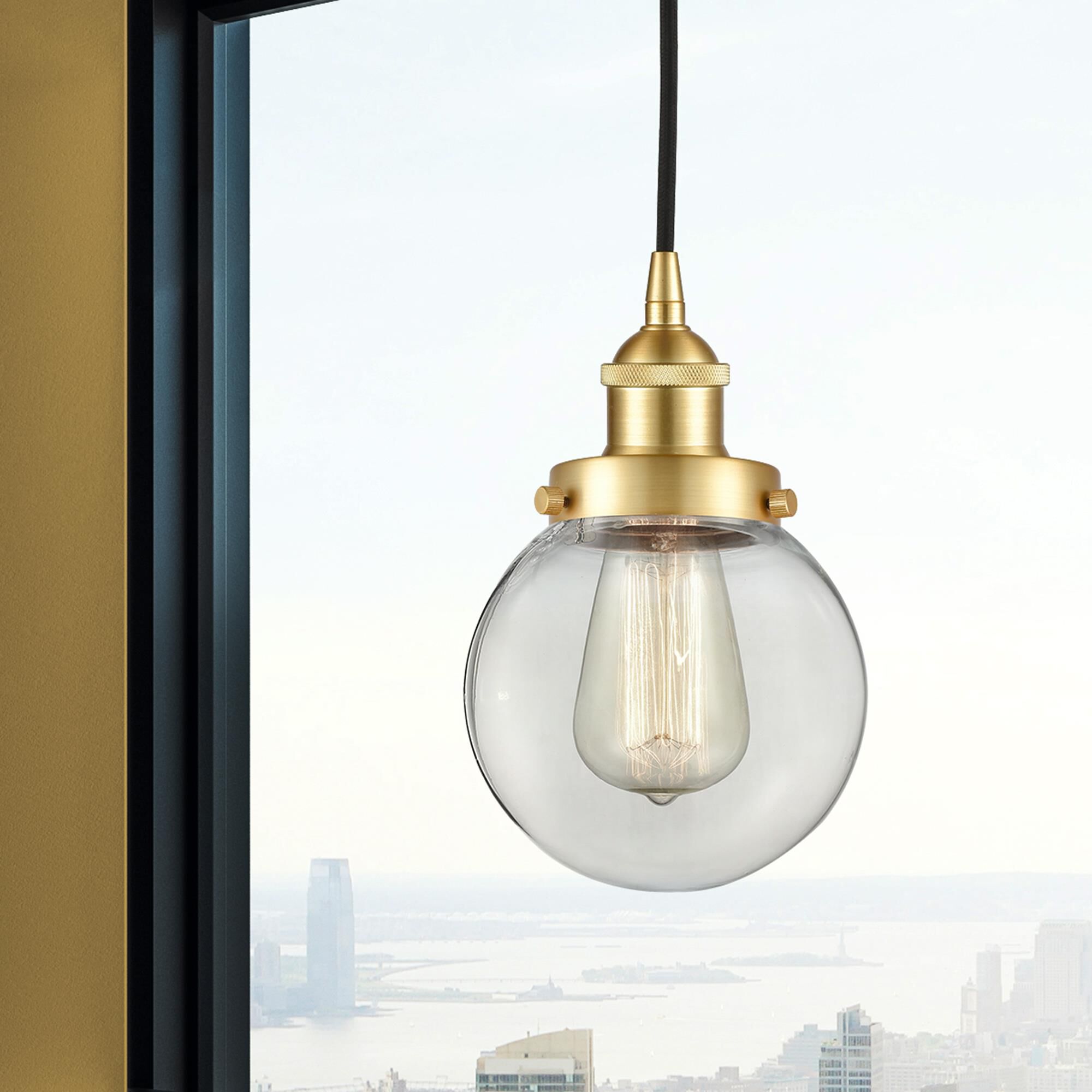 Shown in Satin Gold finish and Clear glass