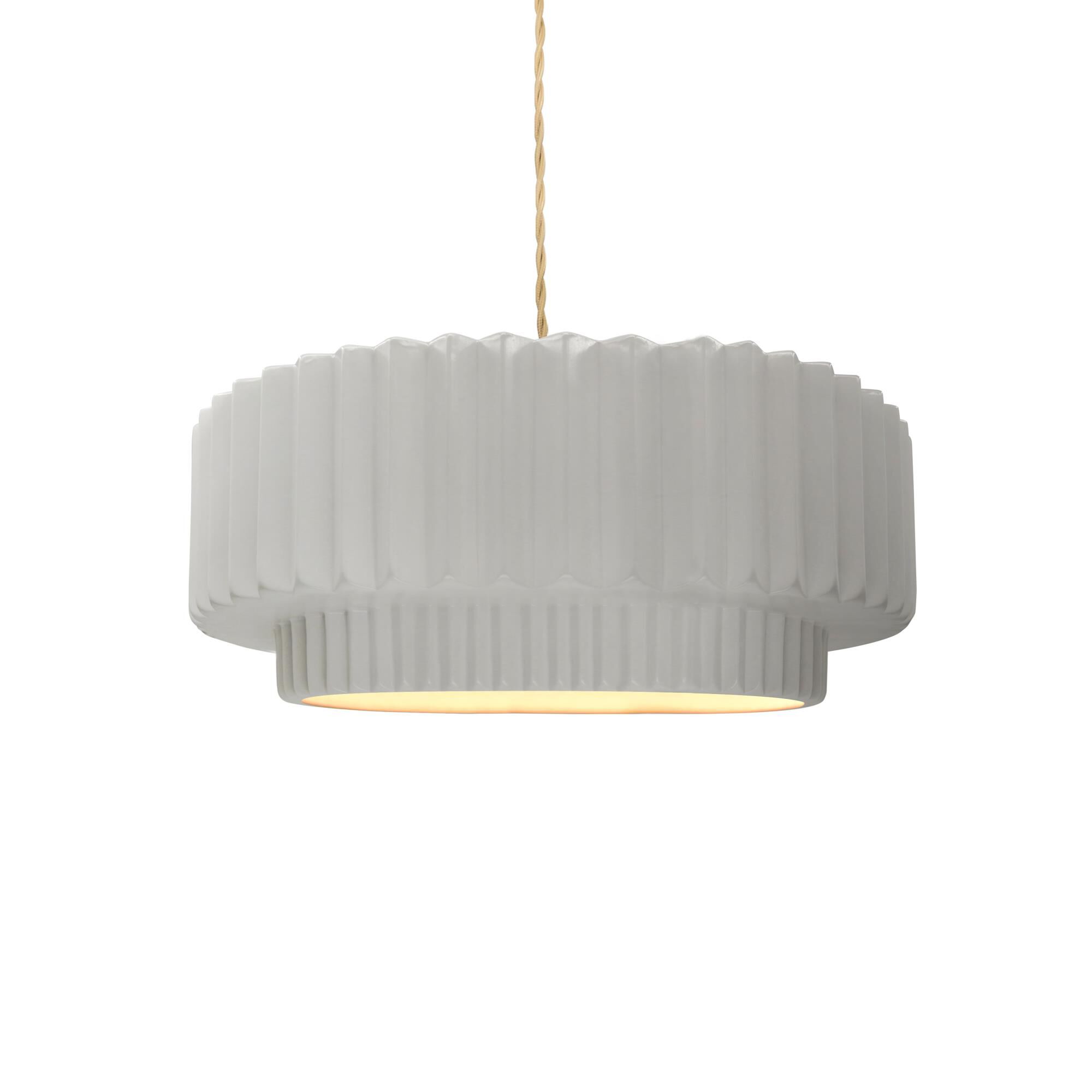 Shown in Brushed Brass finish and Bisque shade
