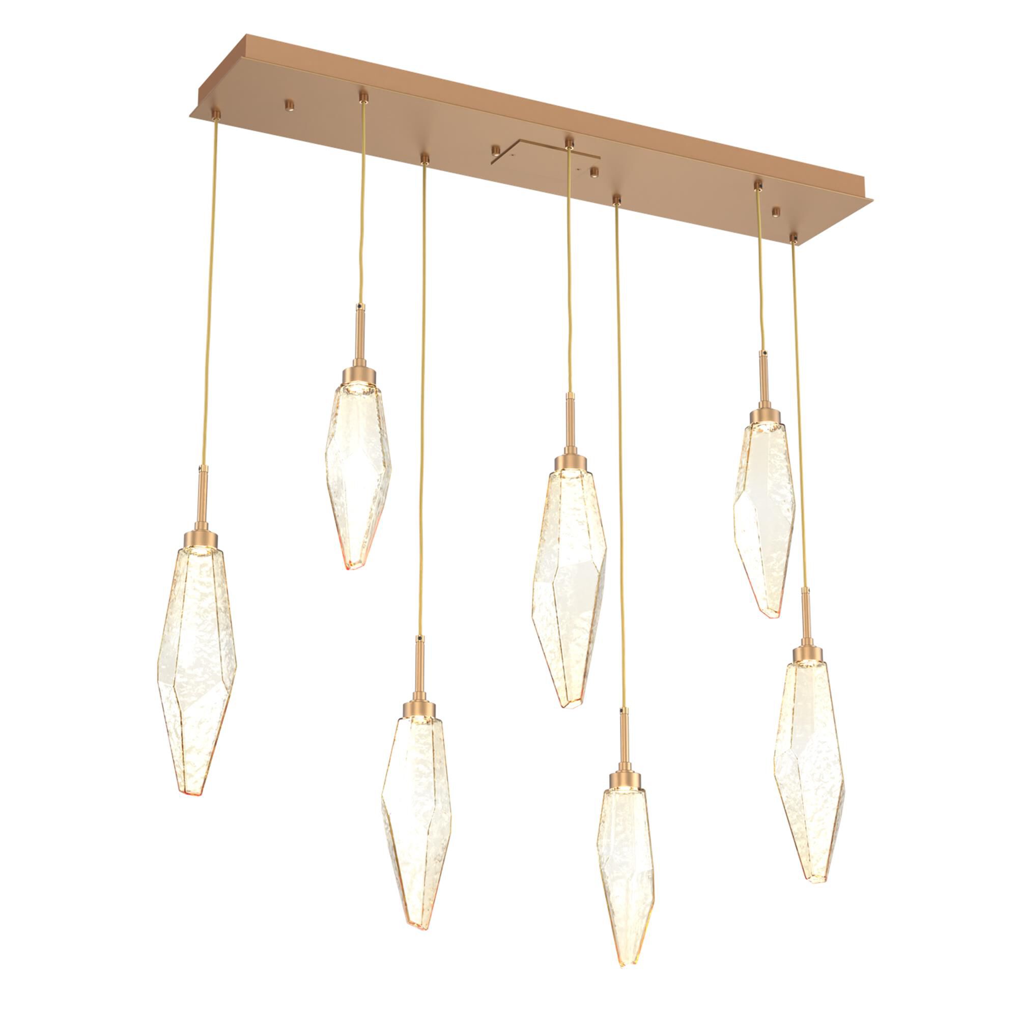 Shown in Novel Brass finish and Chilled Blown And Amber glass