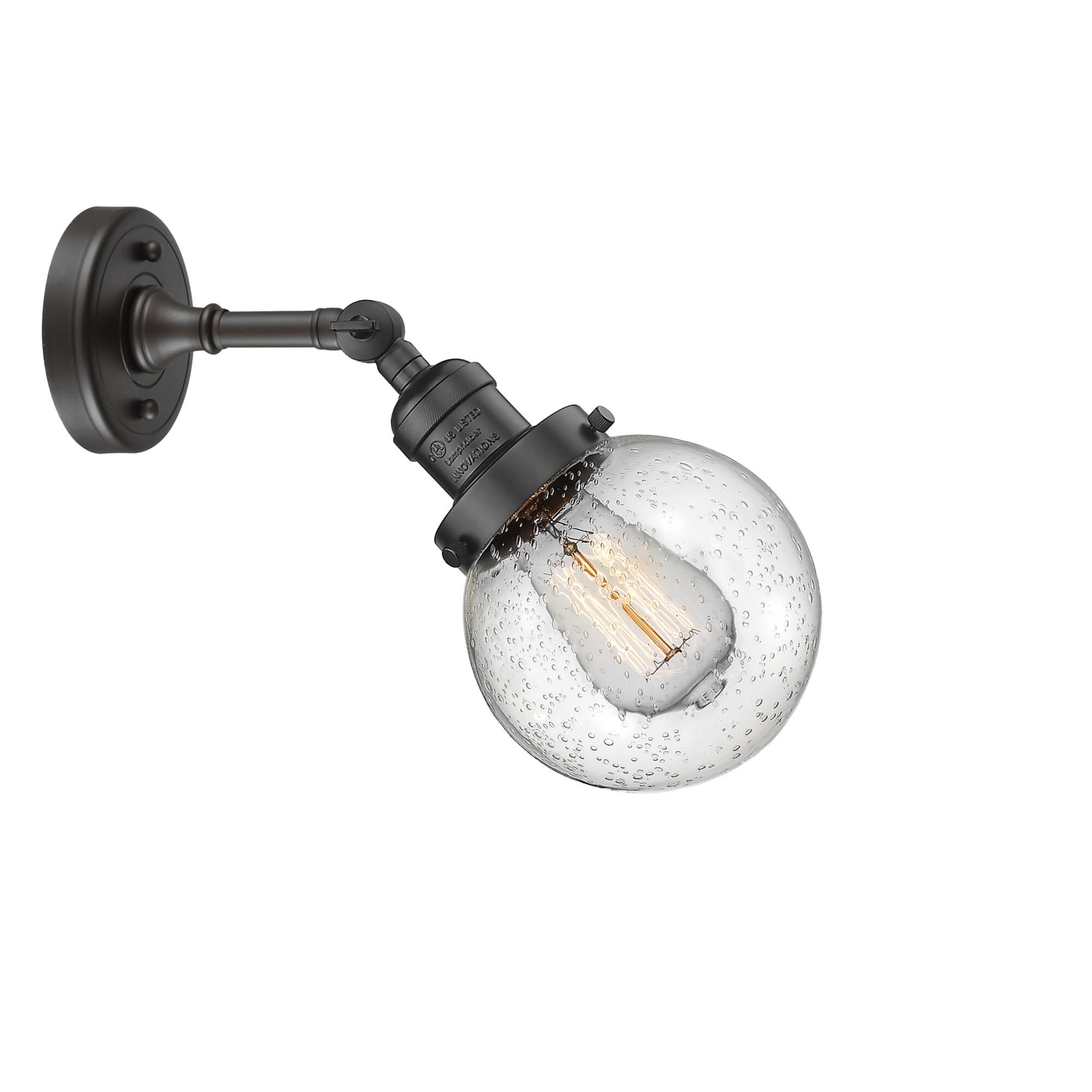 Shown in Oil Rubbed Bronze finish and Seedy glass and No Accent accent
