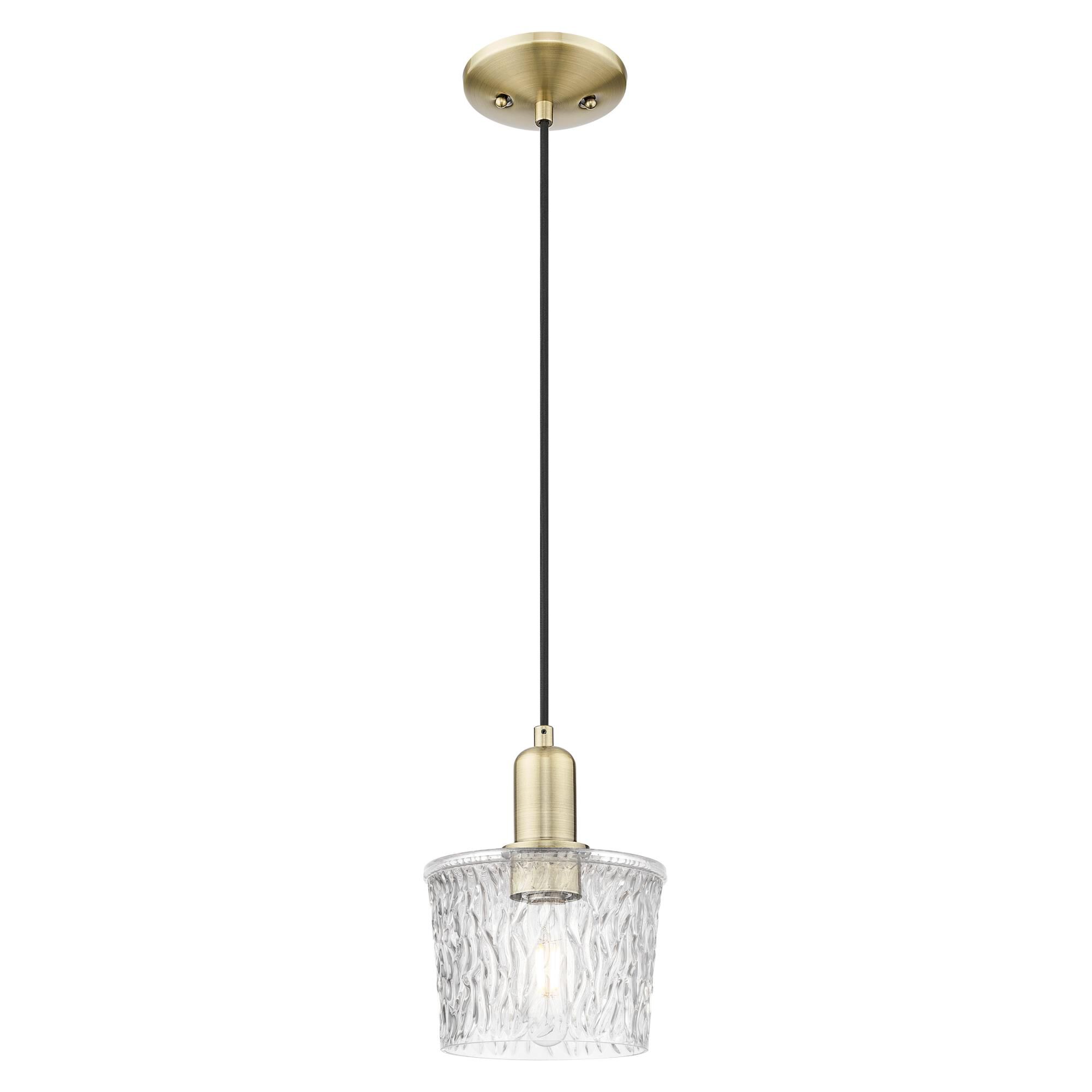 Shown in Antique Brass finish and Clear glass