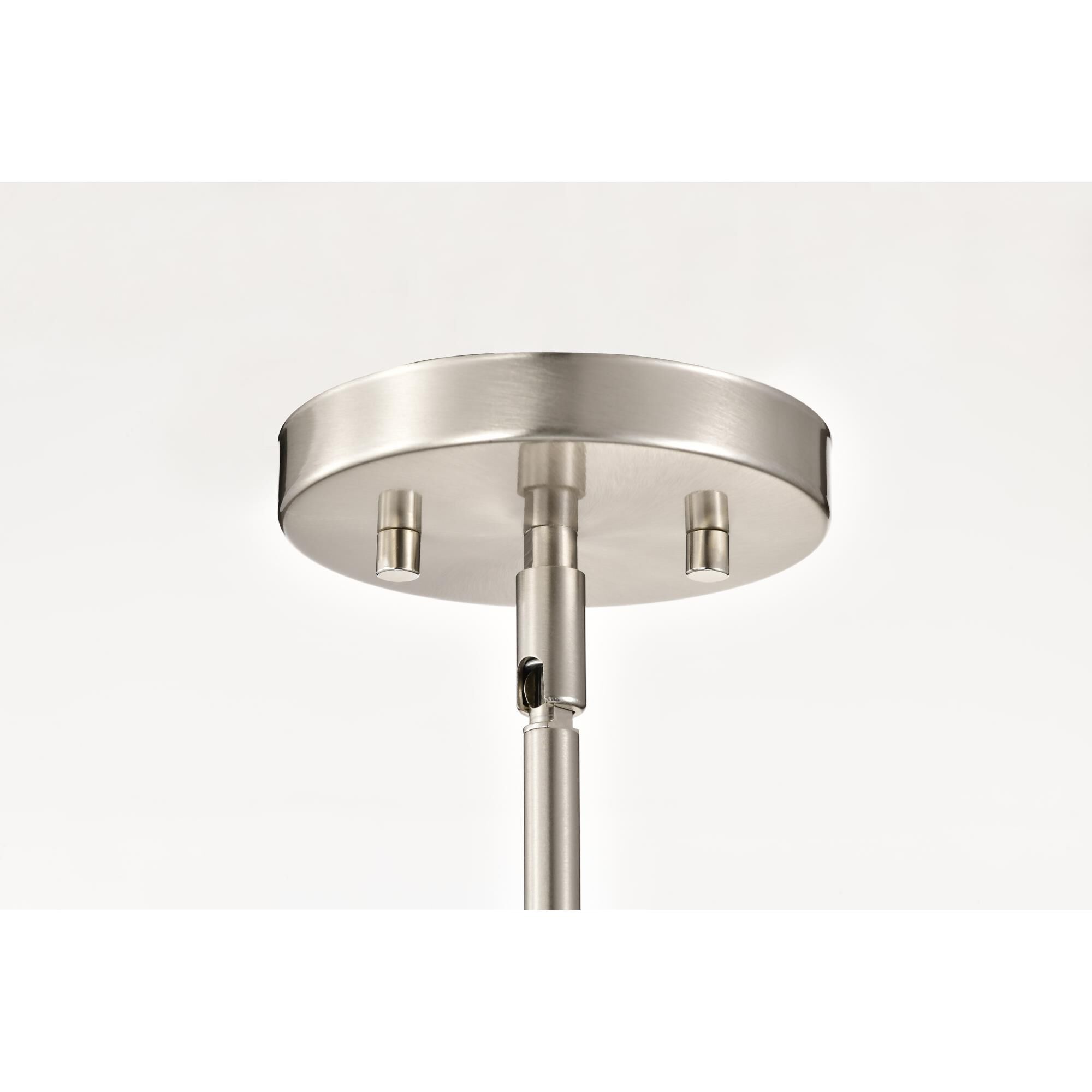 Shown in Brushed Nickel finish and Ribbed White glass