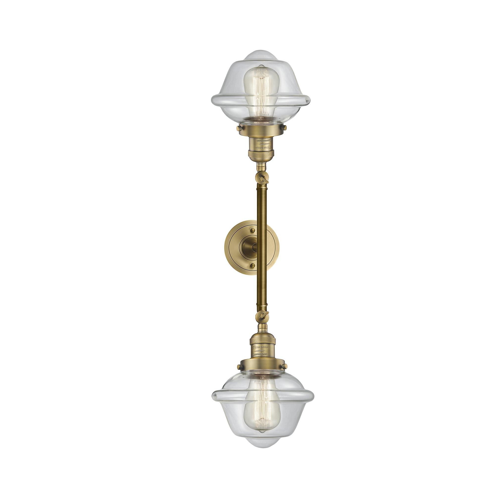Shown in Brushed Brass finish and Clear glass