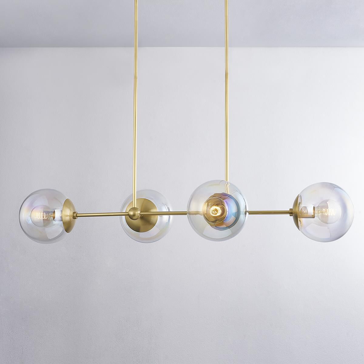 Shown in Aged Brass finish and Clear Plated Iridescent glass