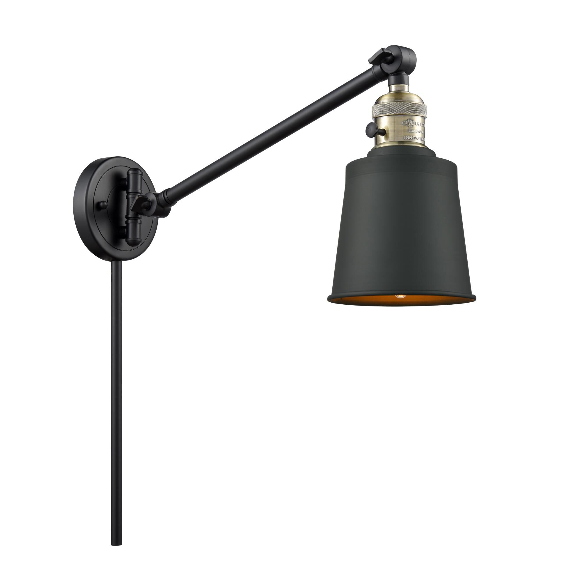 Shown in Black Antique Brass finish and Matte Black shade