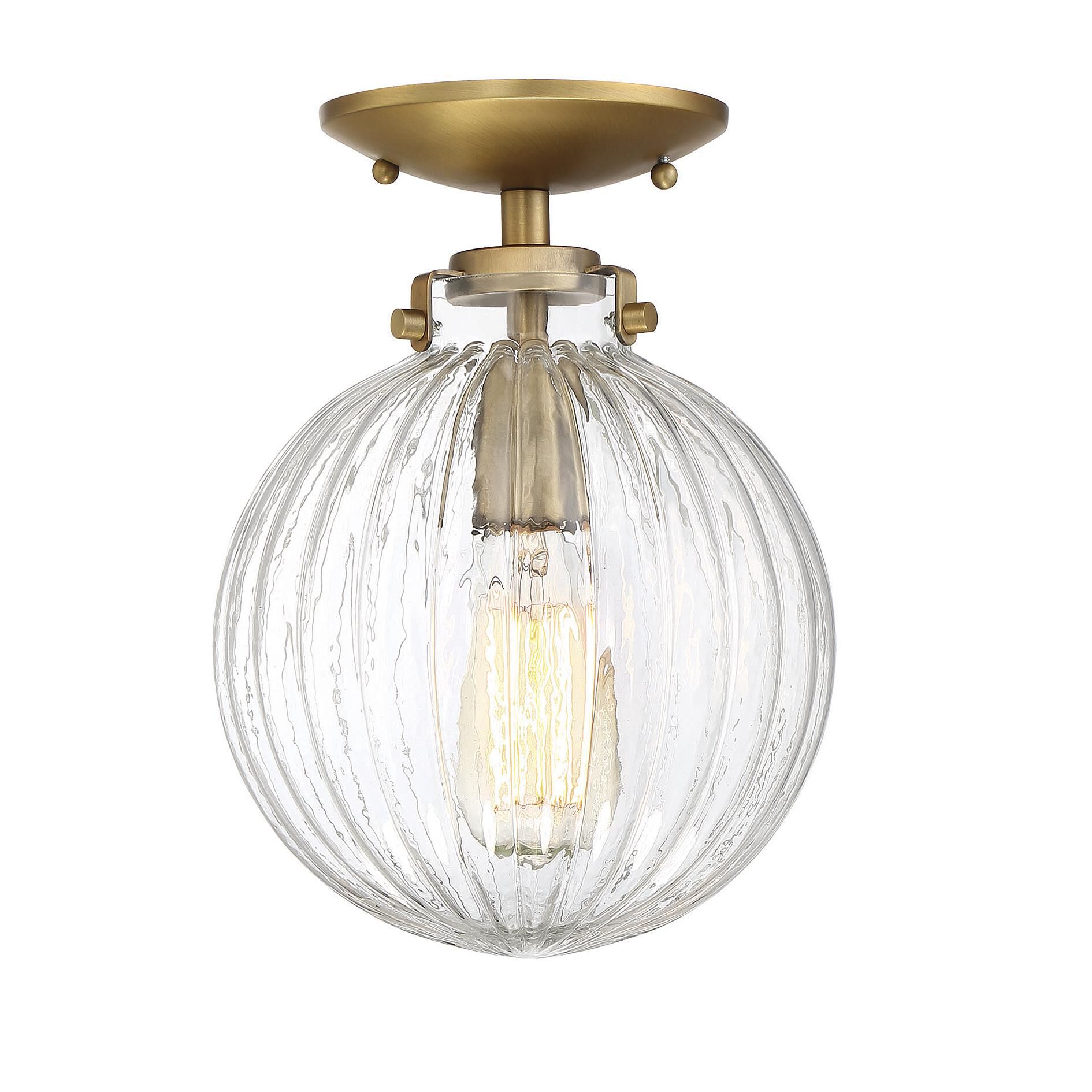 Shown in Natural Brass finish and Clear Ribbed glass