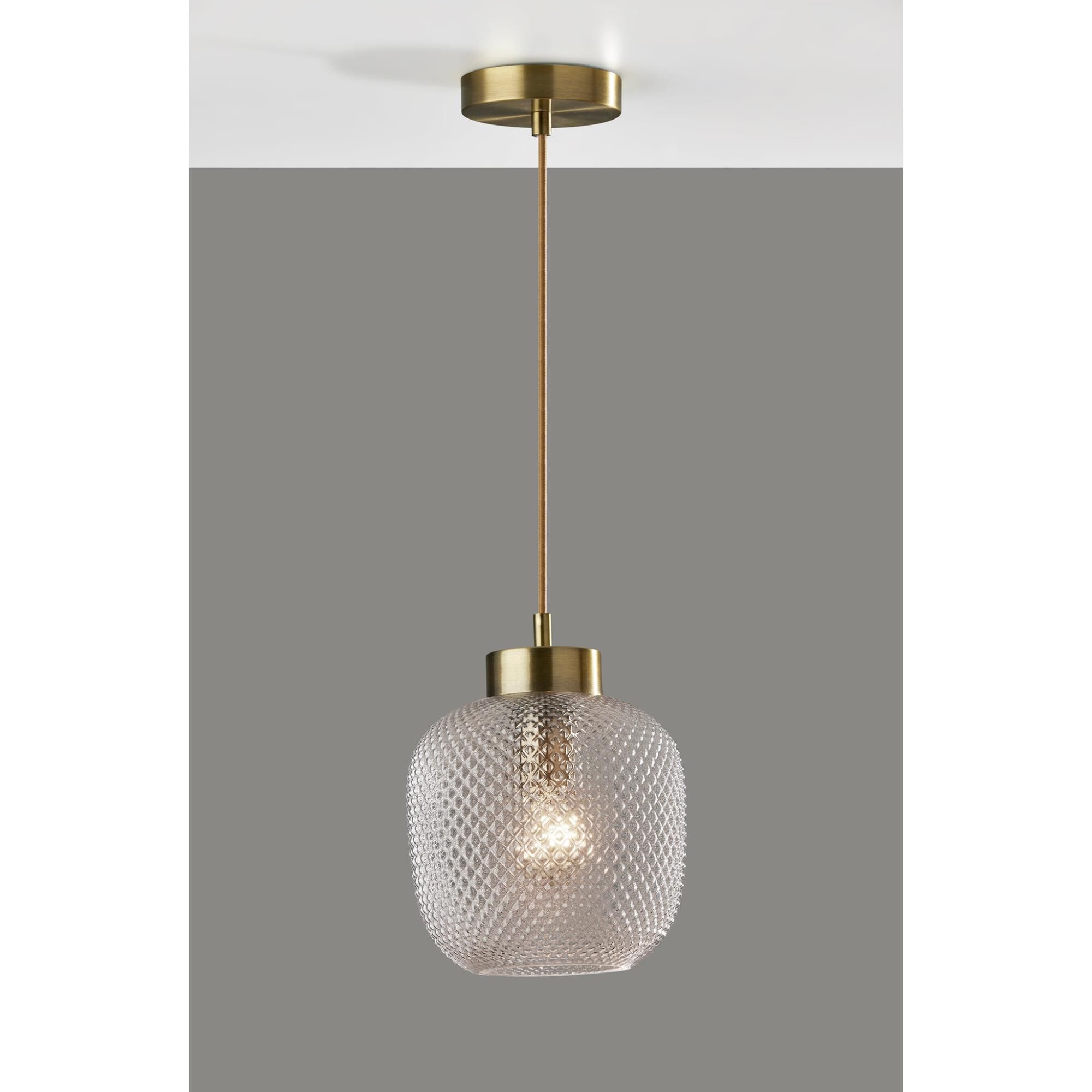 Shown in Antique Brass finish and Clear Textured Glass shade