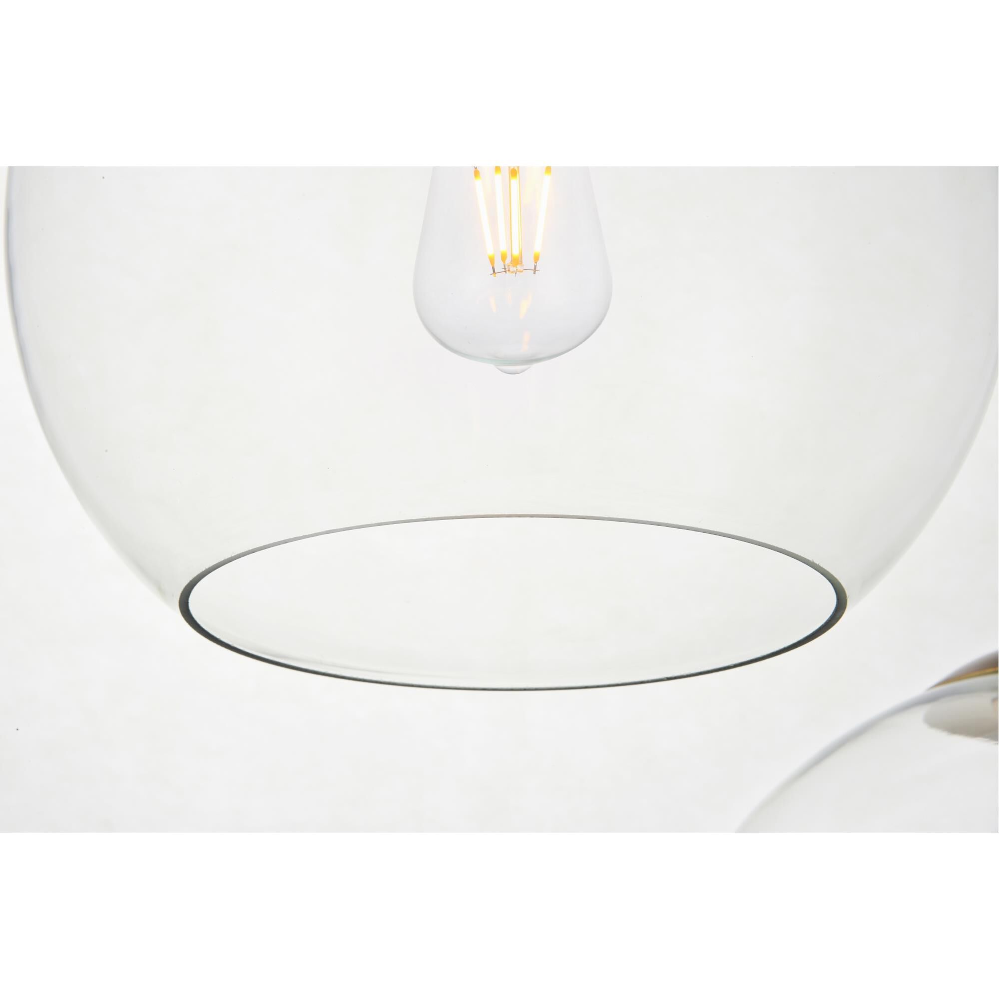 Shown in Brass finish and Clear glass