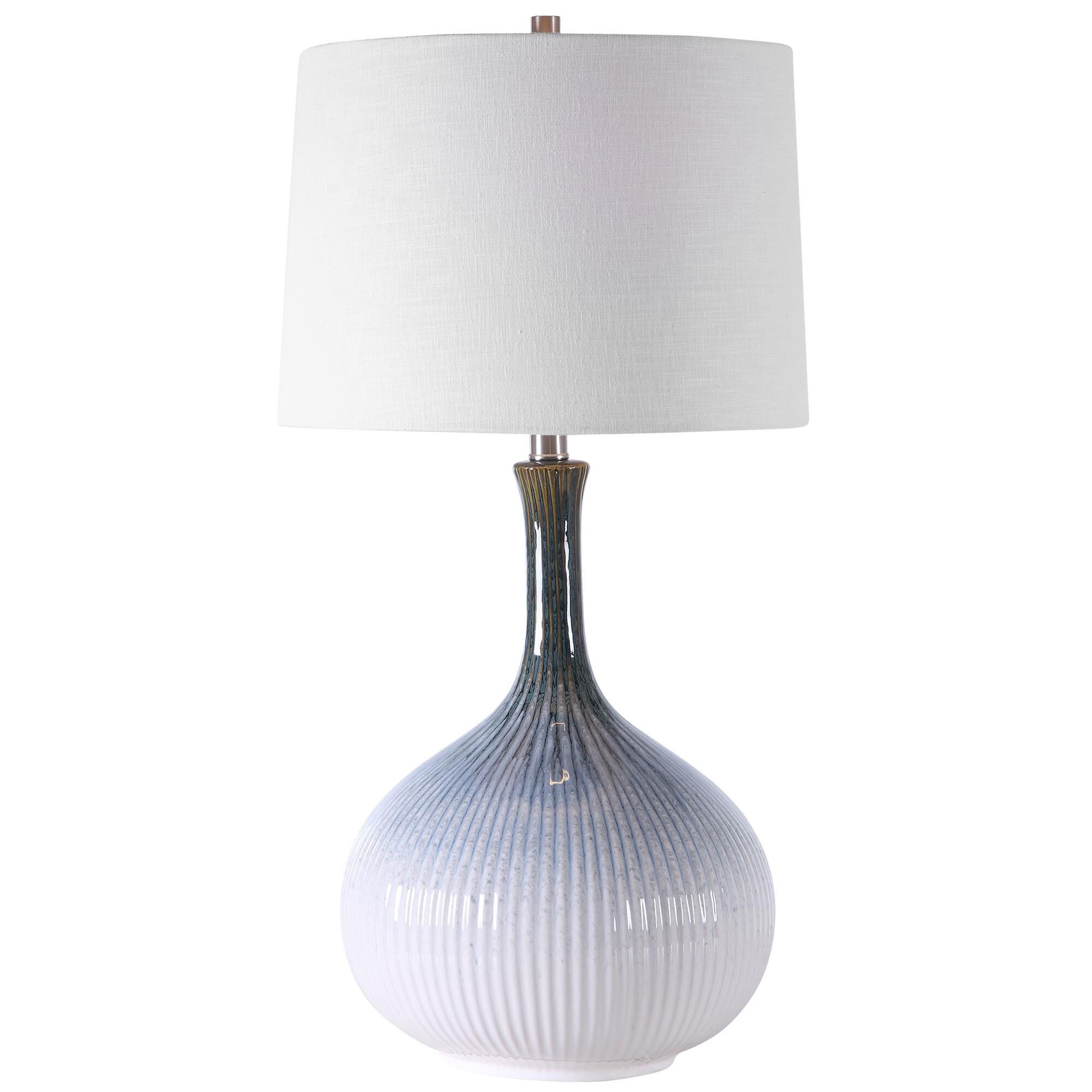 Shown in Mid-Century Inspired Table Lamp Has A Fluted Ceramic Base With Noticeable Ribbed Texture And Is Fini finish and Round Hardback shade