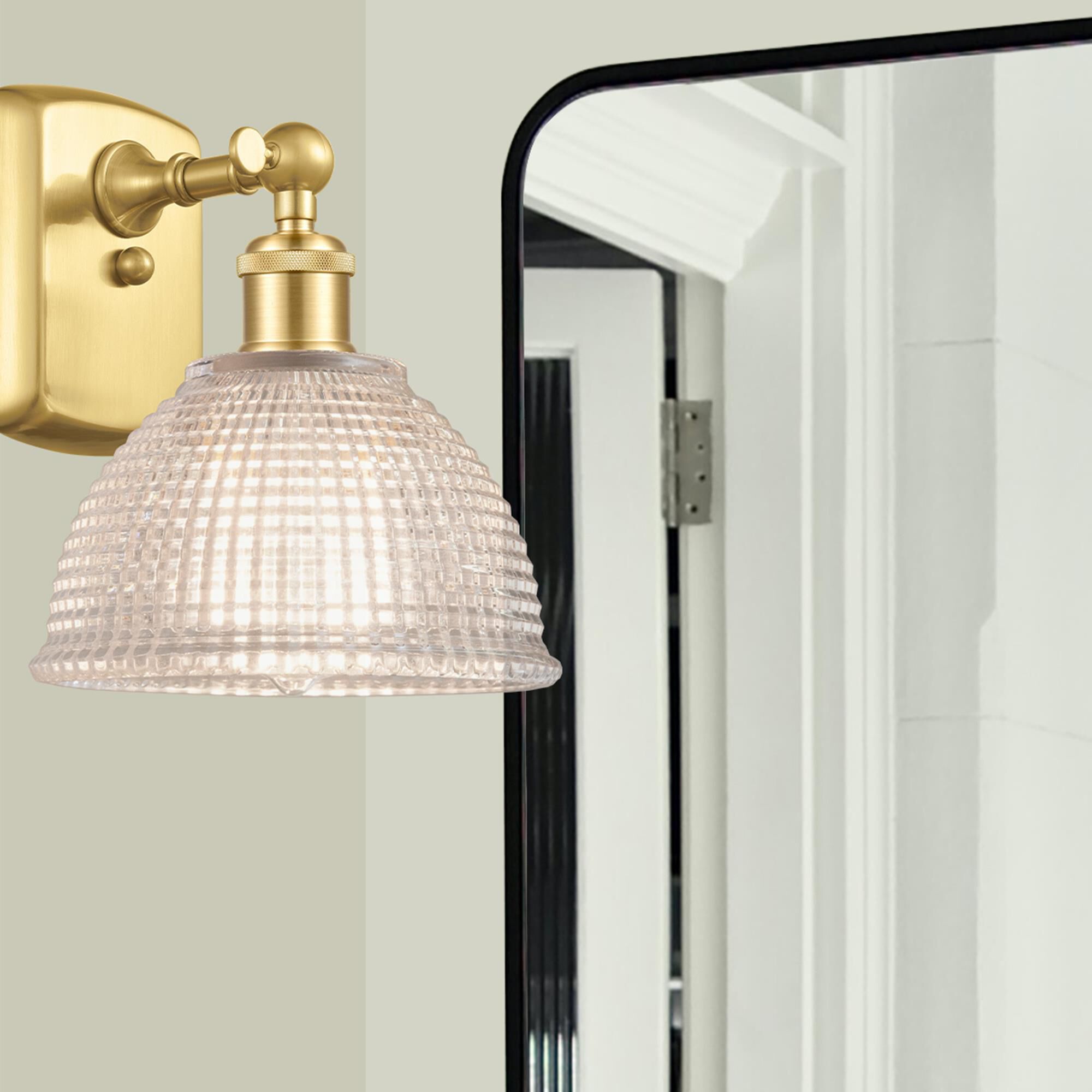 Shown in Satin Gold finish and Clear Arietta glass and Polished Chrome accent