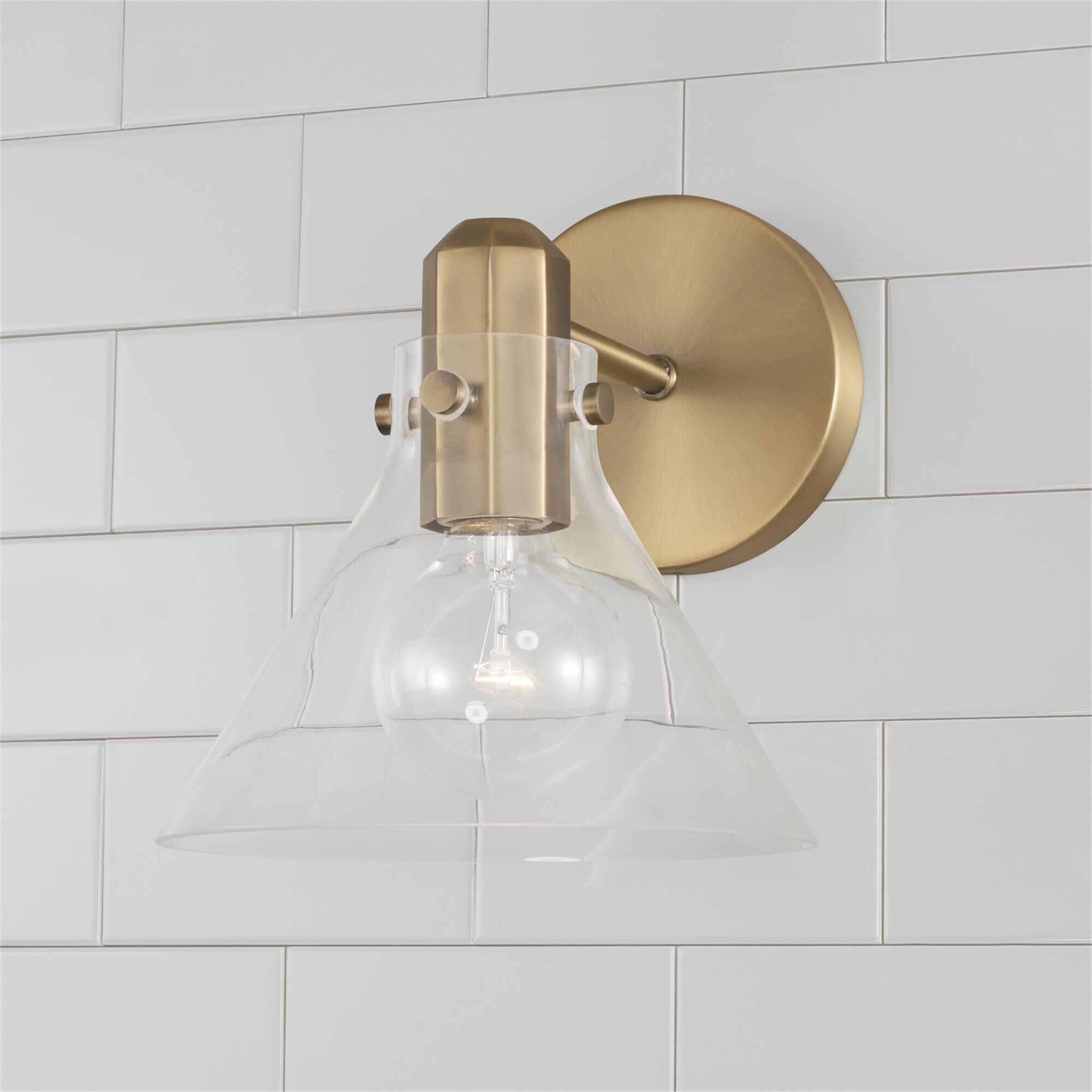 Shown in Aged Brass finish and Clear glass