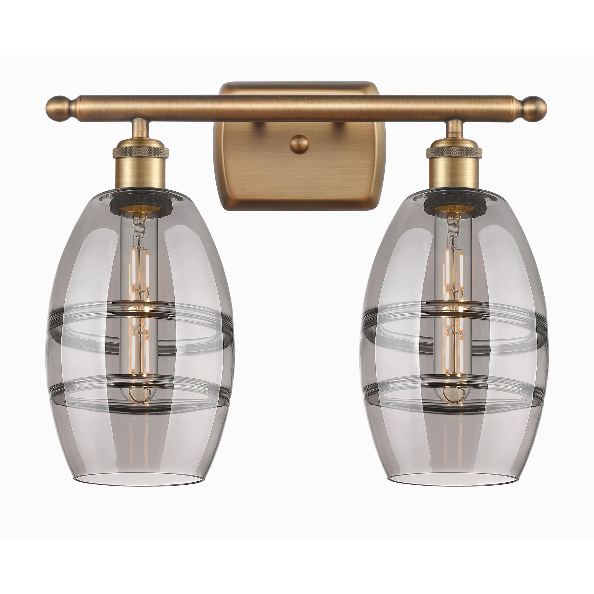 Shown in Brushed Brass finish and Light Smoke glass