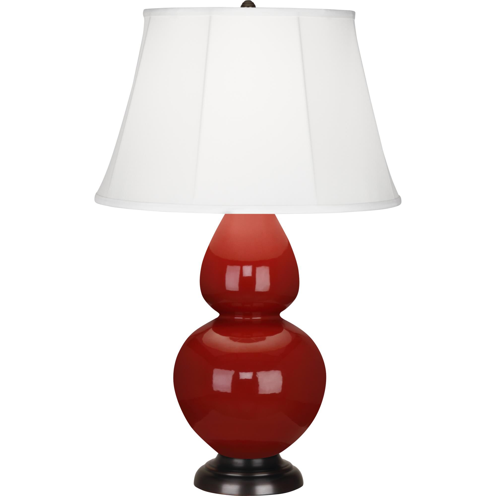 Shown in Oxblood Glazed Ceramic With Deep Patina Bronze ed Accents finish and Ivory Silk Stretched Fabric  shade