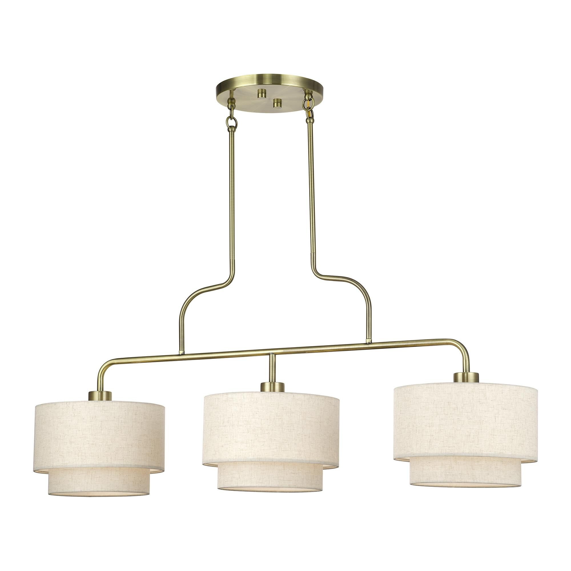 Shown in Antique Brass finish and Hand Crafted Oatmeal Color Fabric with White Color Inside shade
