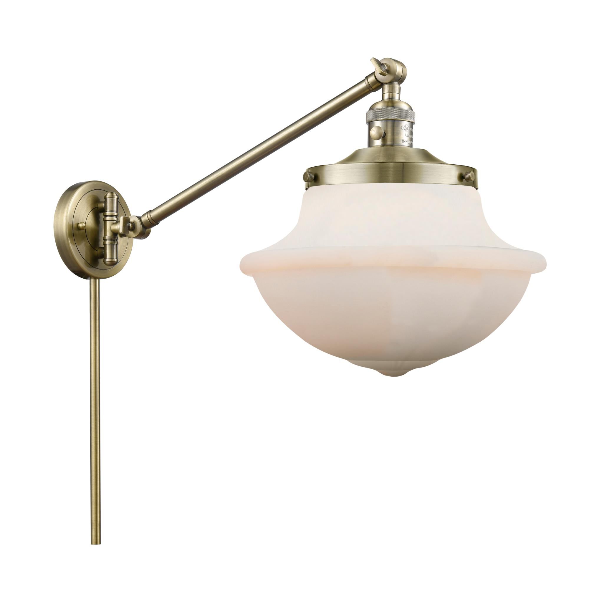 Shown in Antique Brass finish and Schoolhouse glass and Glass shade