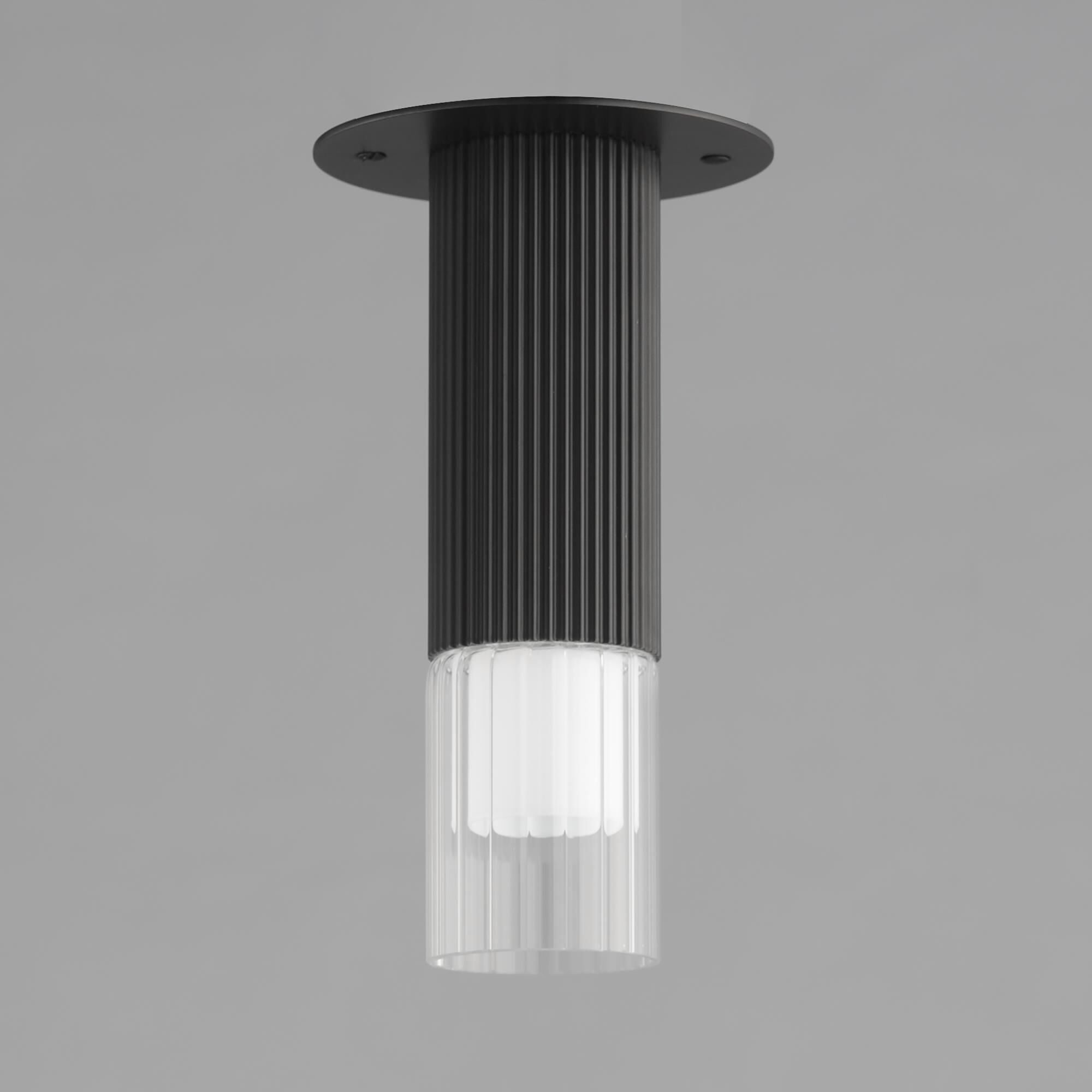Shown in Black finish and Clear Ribbed glass