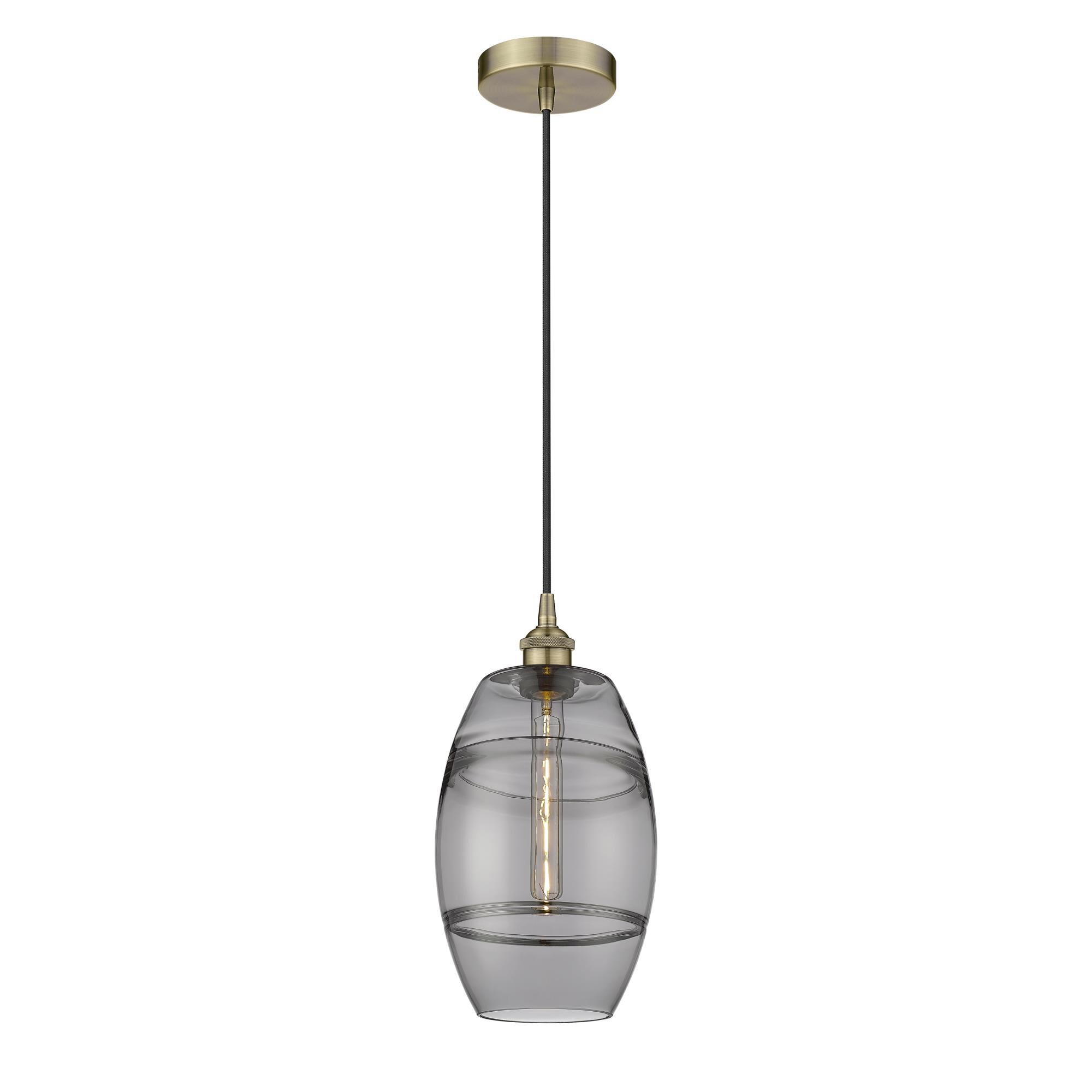 Shown in Antique Brass finish and Light Smoke glass