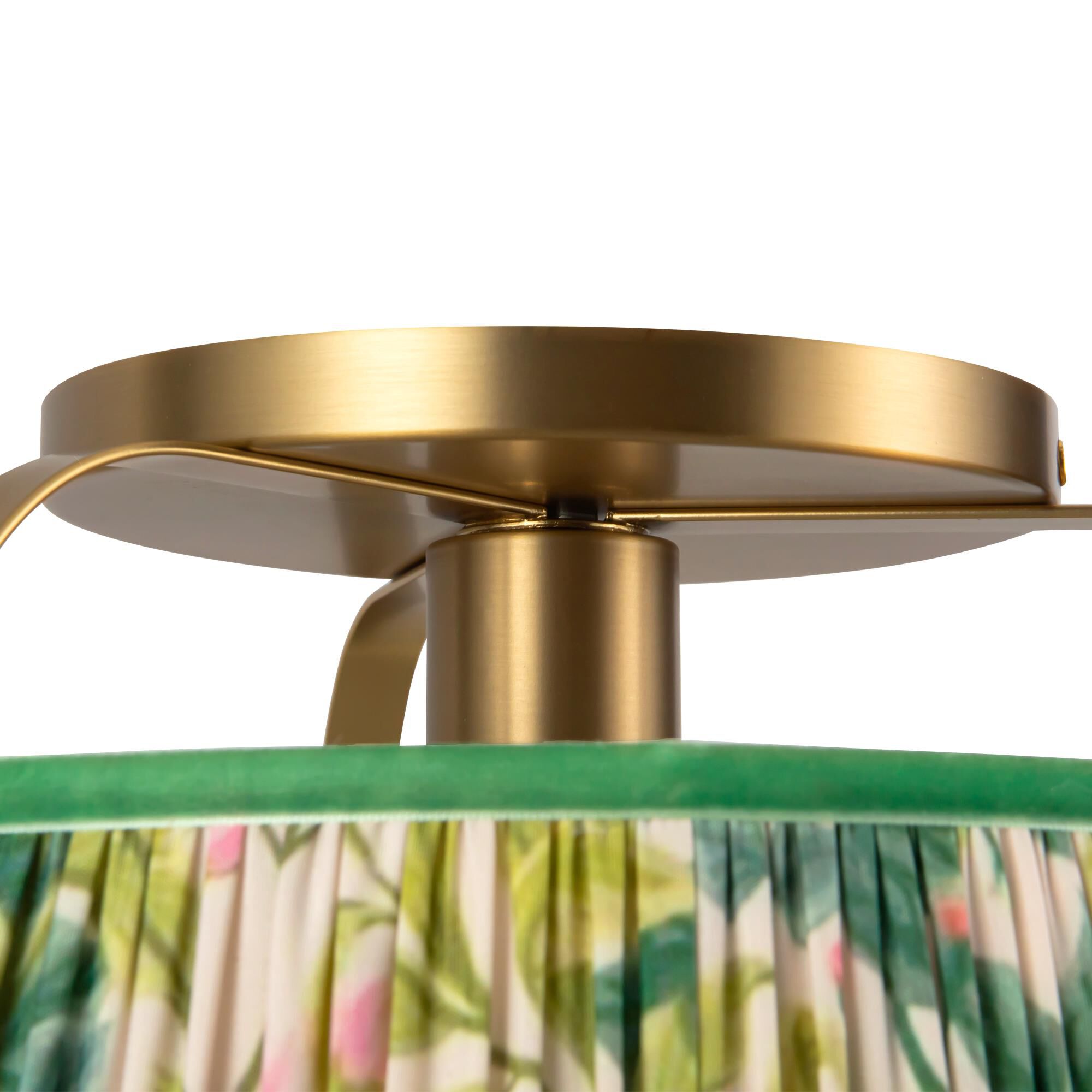 Shown in Brushed Gold finish and Frosted Polycarbonate Diffuser glass and Green Linen shade