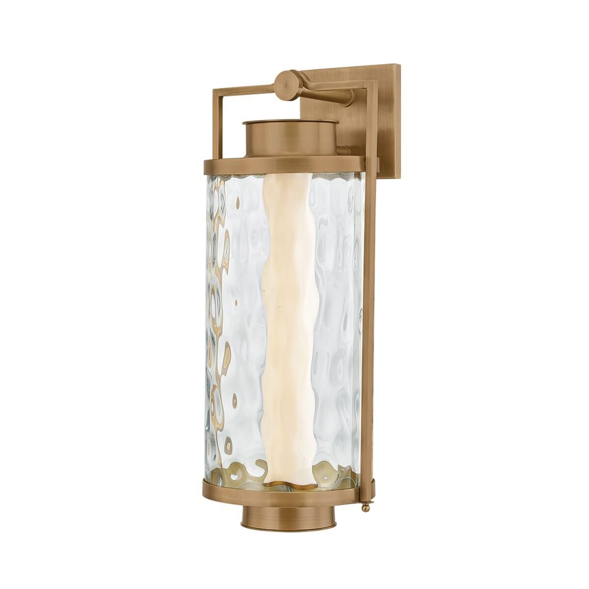 Shown in Patina Brass finish and Water Glass shade