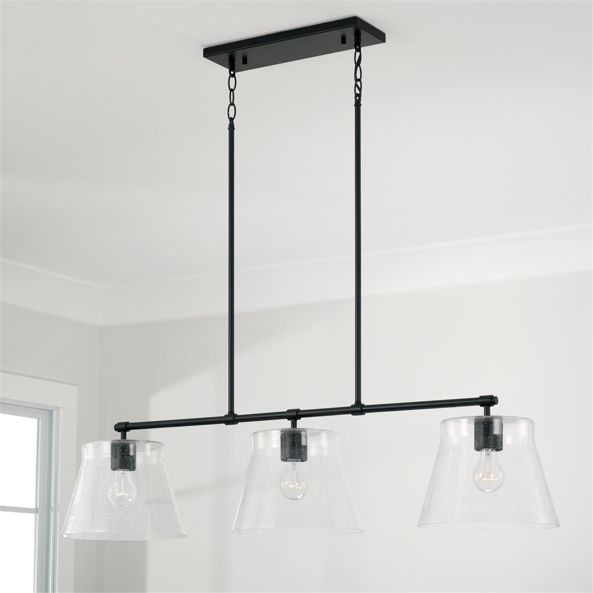 Shown in Matte Black finish and Clear Seeded glass