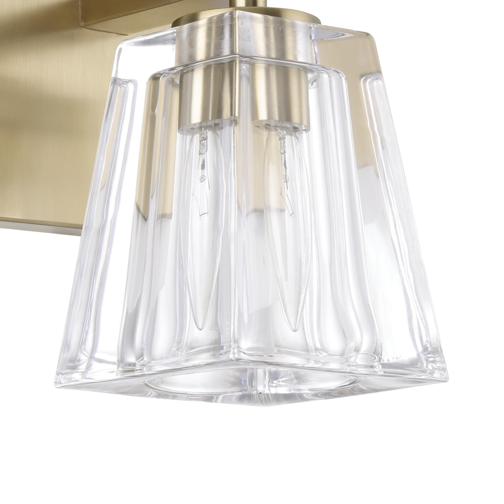 Shown in Champagne Gold finish and Clear Pressed glass