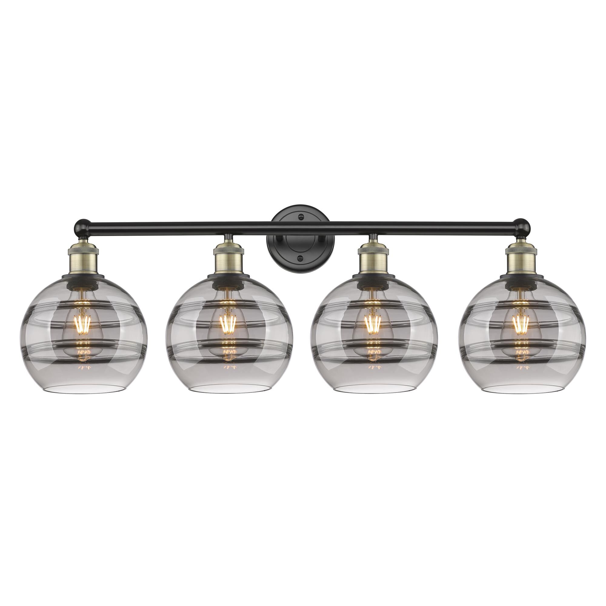 Shown in Black Antique Brass finish and Light Smoke glass