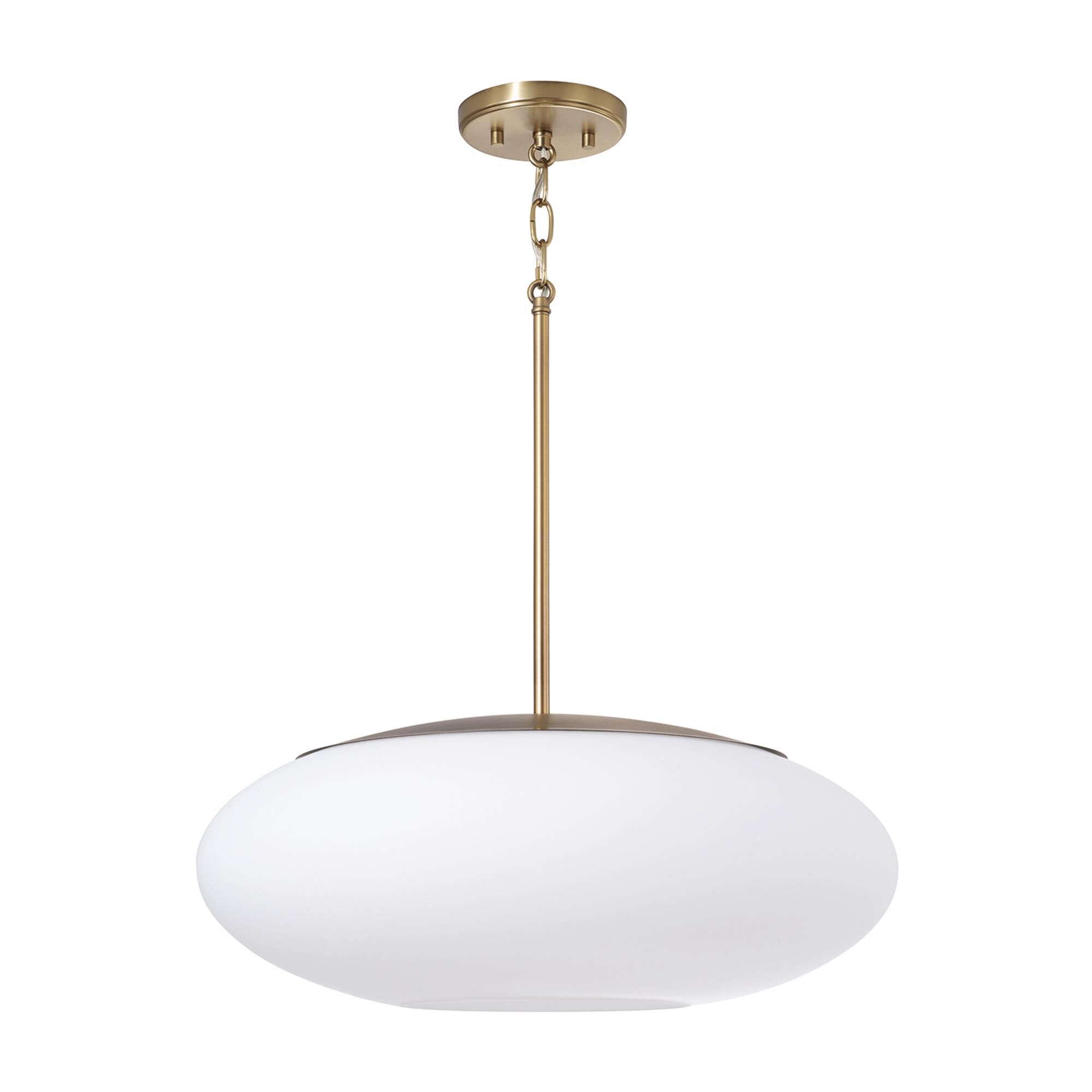 Shown in Aged Brass finish and Soft White glass