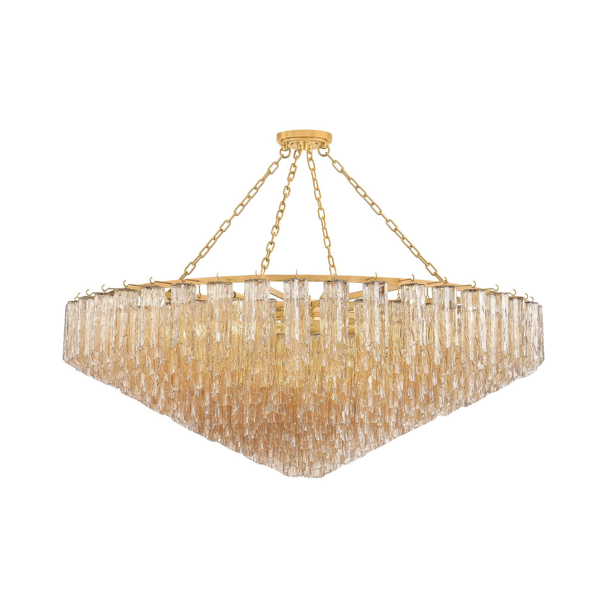 Shown in Aged Brass finish and Tronchi shade