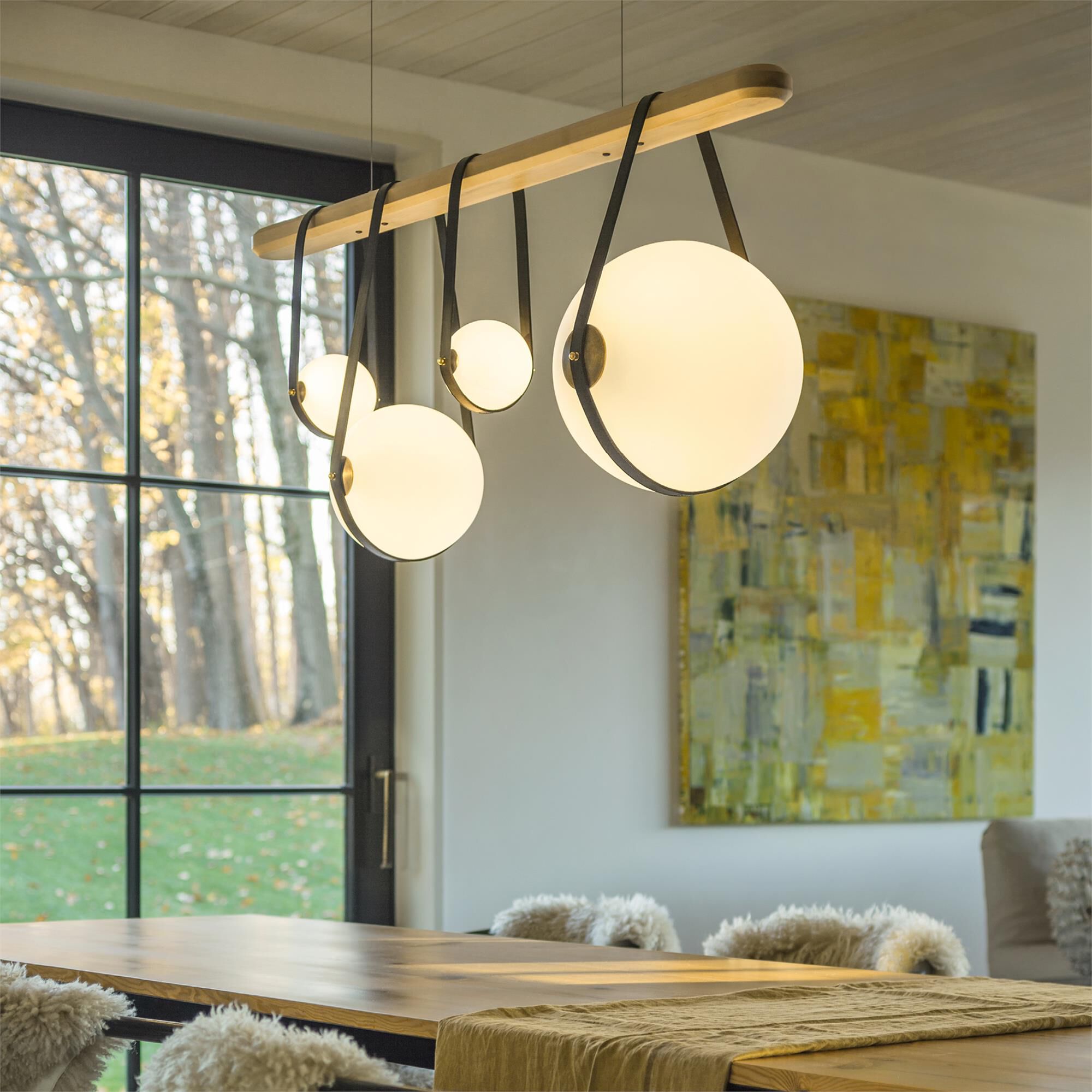 Shown in Black finish and Opal glass and Antique Brass accent