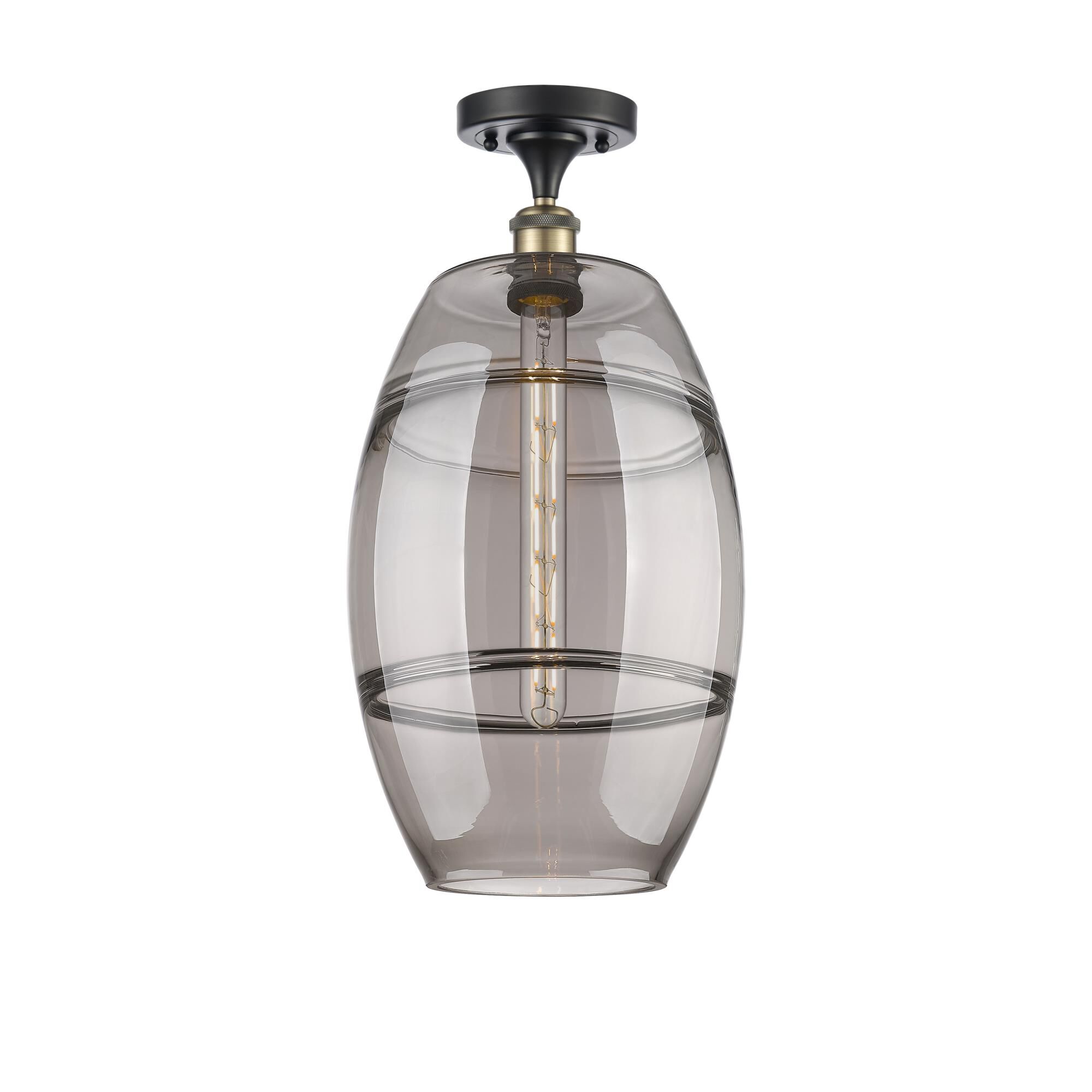 Shown in Black Antique Brass finish and Light Smoke glass