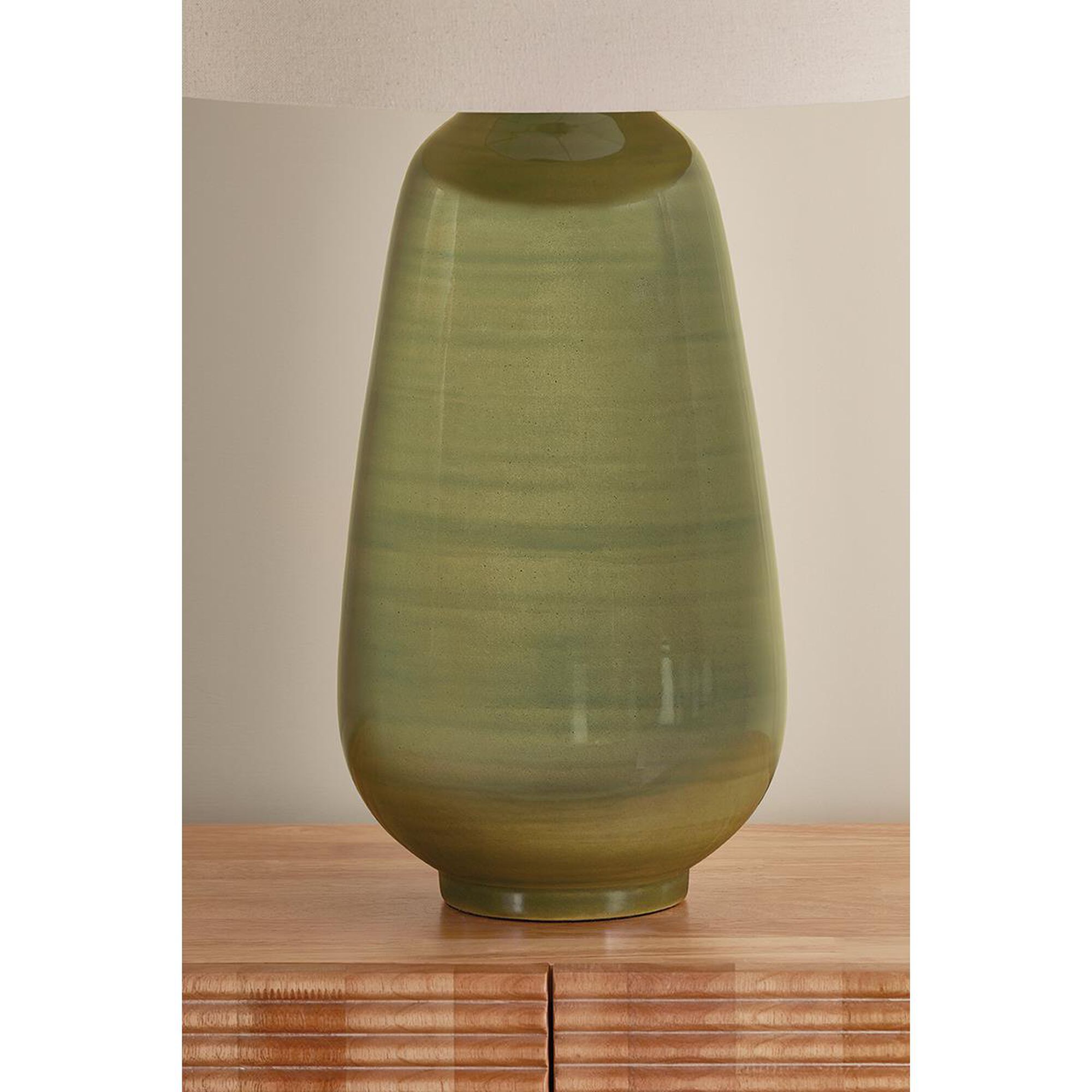 Shown in Aged Brass and Ceramic Dark Forrest finish and Wheat Linen shade