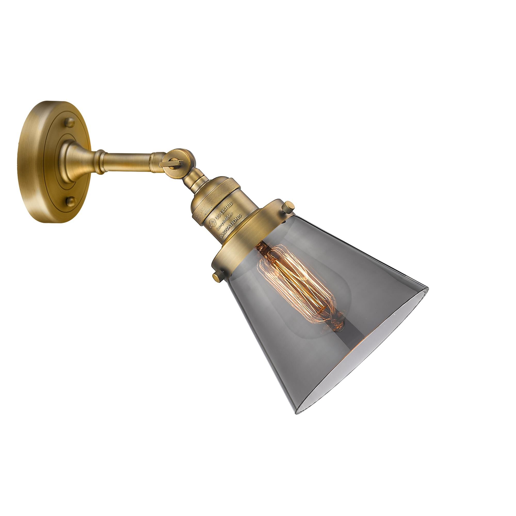 Shown in Brushed Brass finish and Smoked glass and None accent
