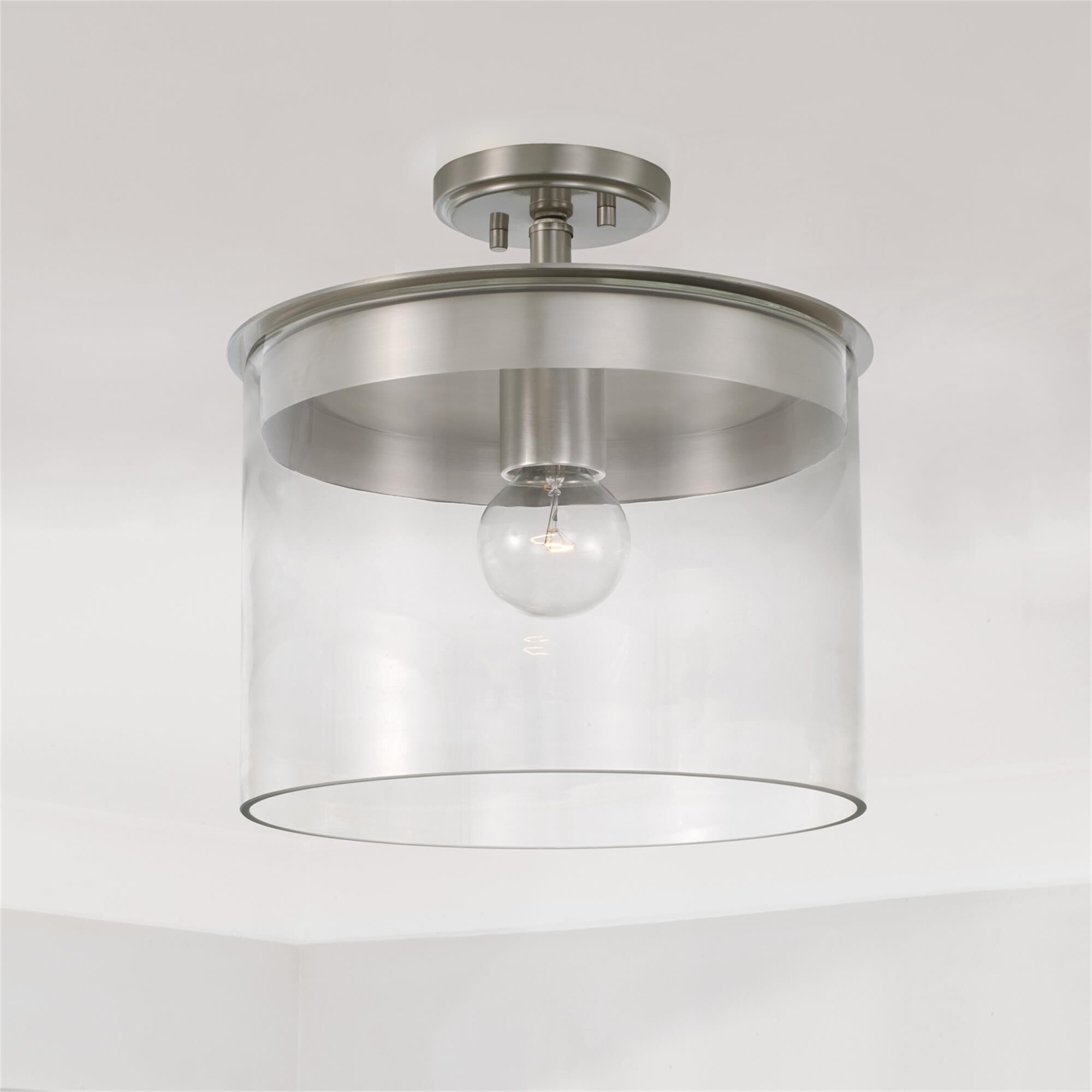 Shown in Brushed Nickel finish and Clear glass