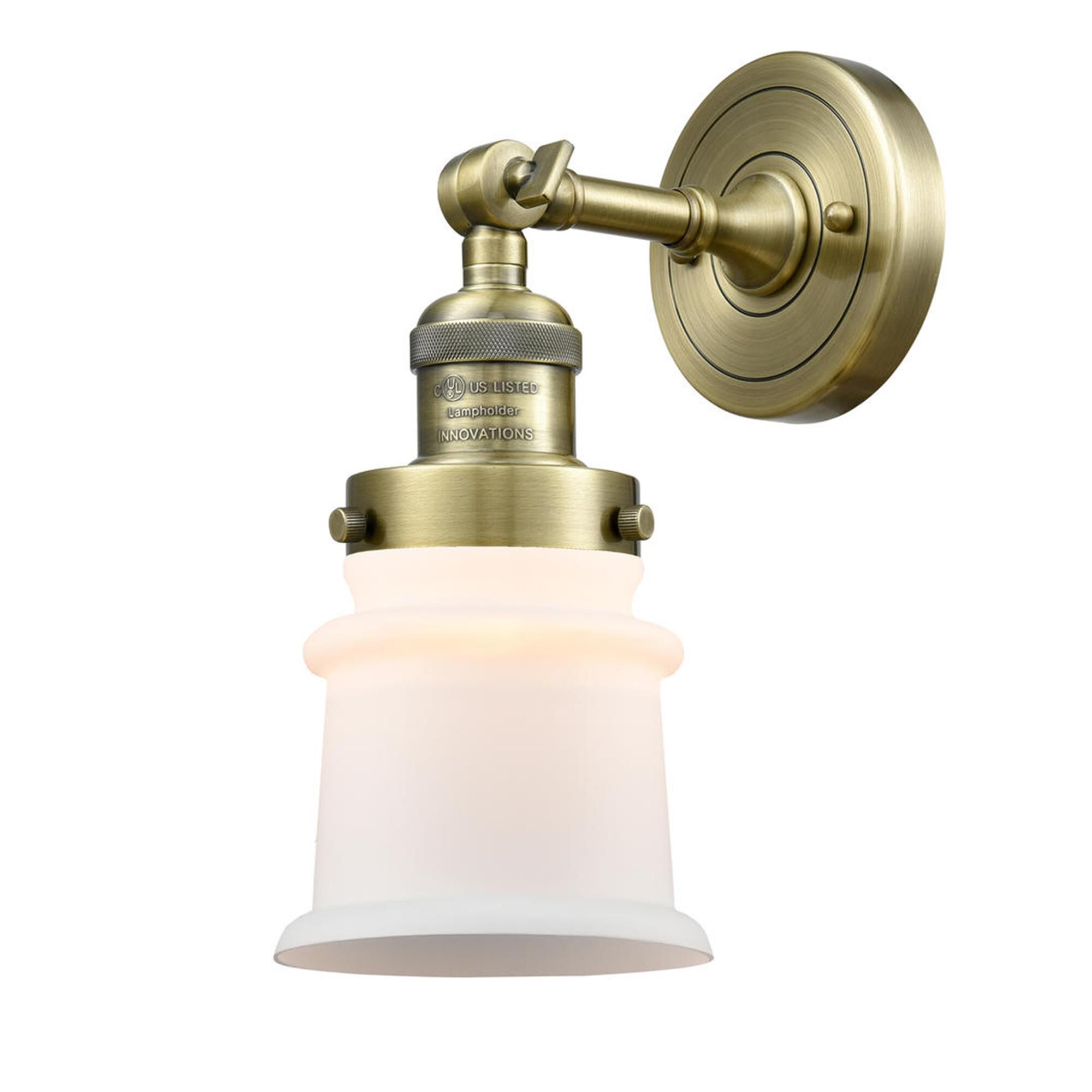 Shown in Antique Brass finish and Frosted glass