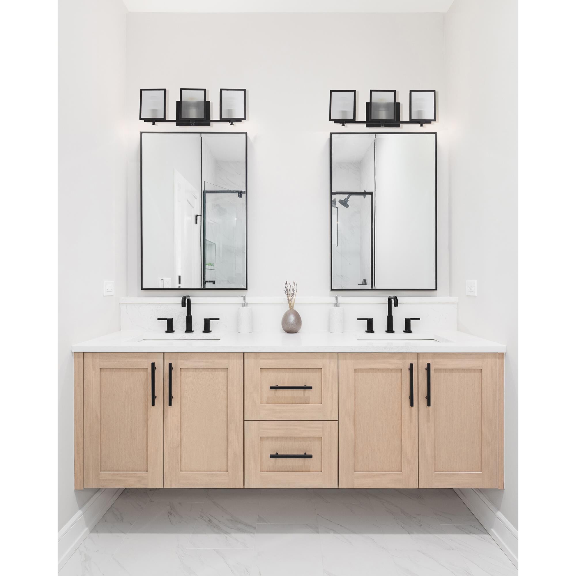 Shown in Black and Brushed Nickel finish and Clear shade