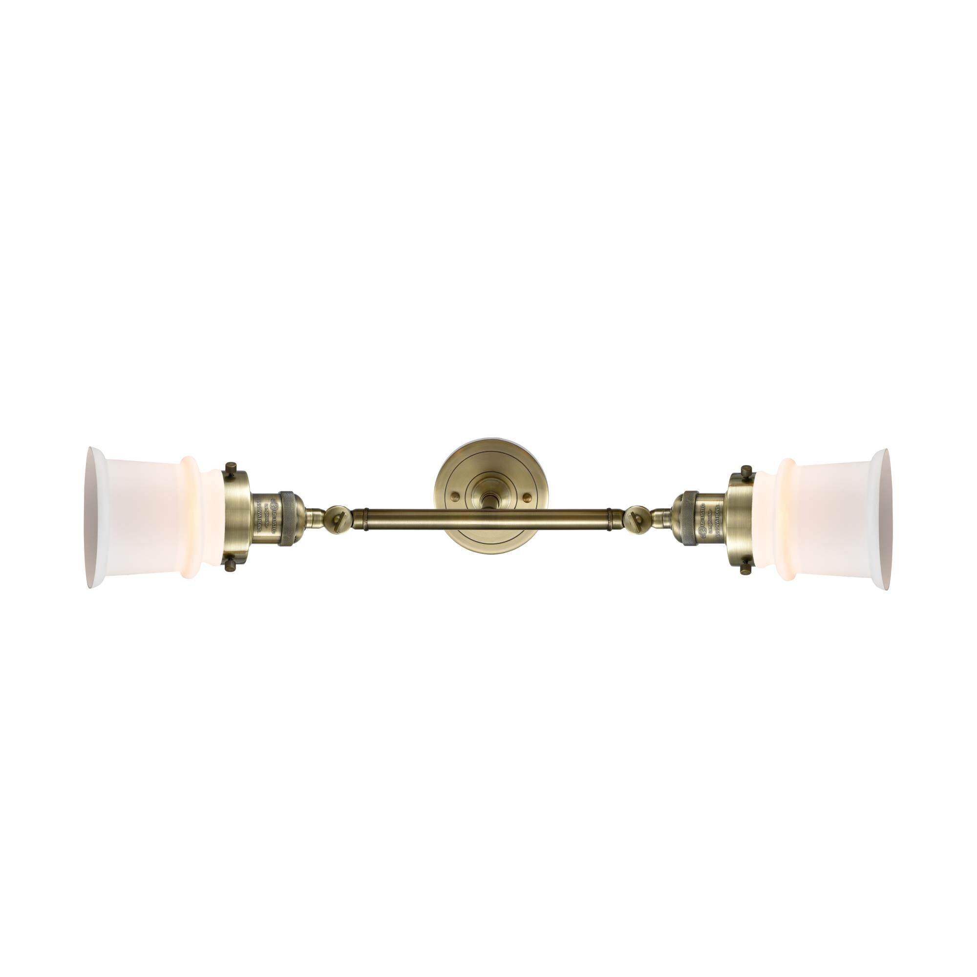 Shown in Antique Brass finish and Matte White Cased glass