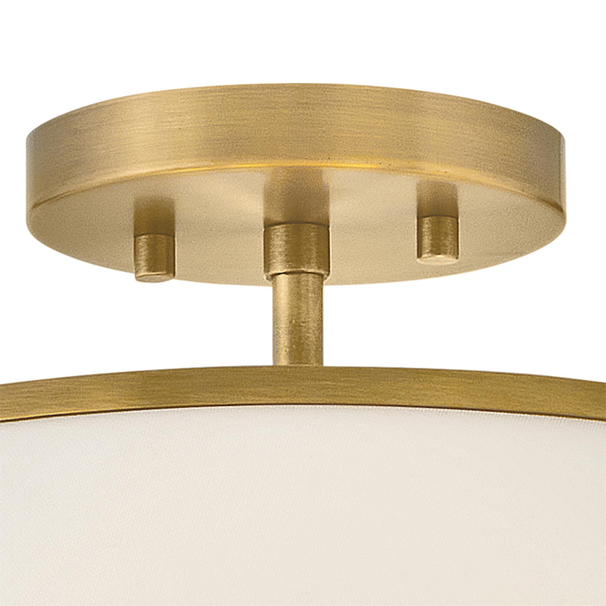 Shown in Lacquered Dark Brass finish and Off-White Linen shade