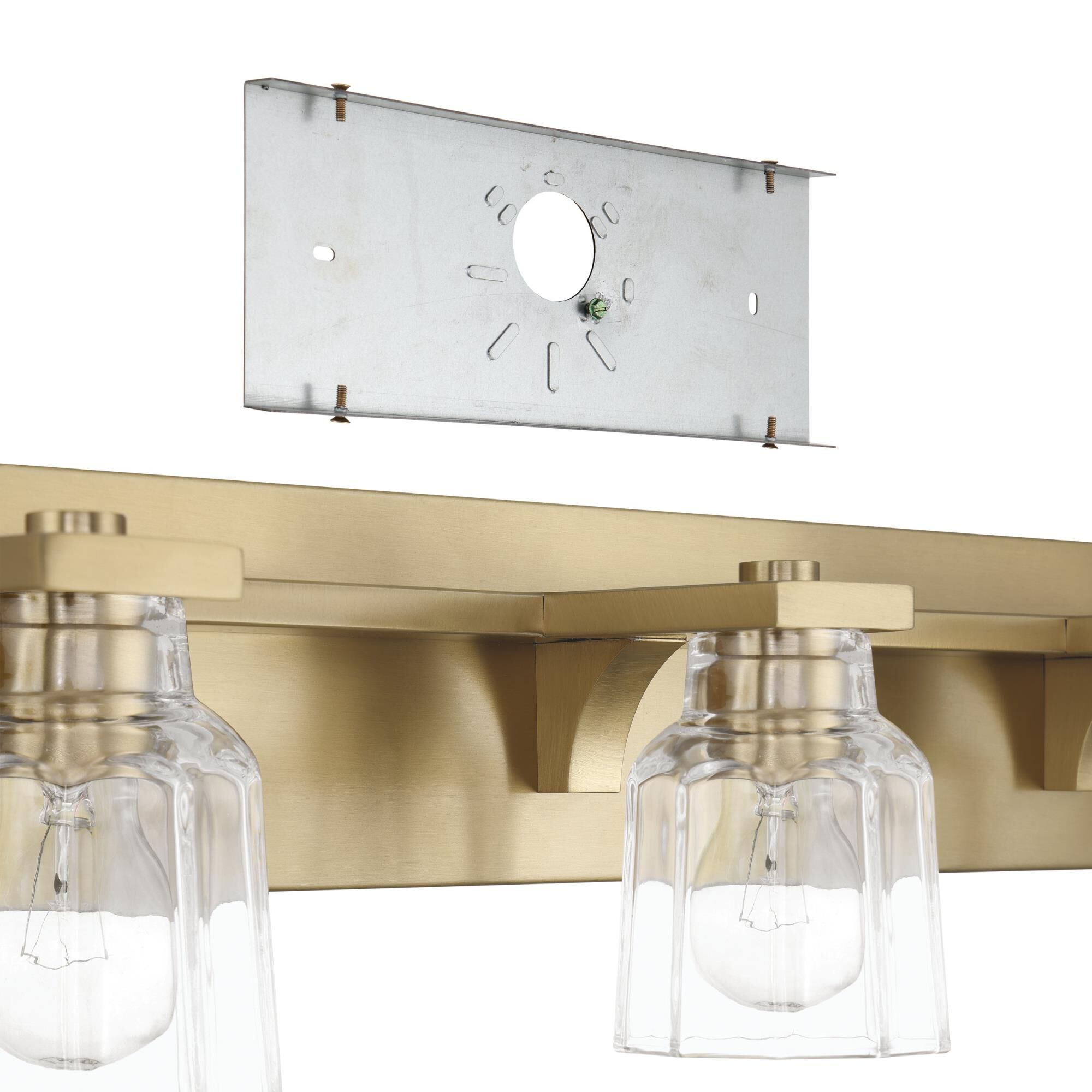 Shown in Champagne Gold finish and Clear Ribbed glass