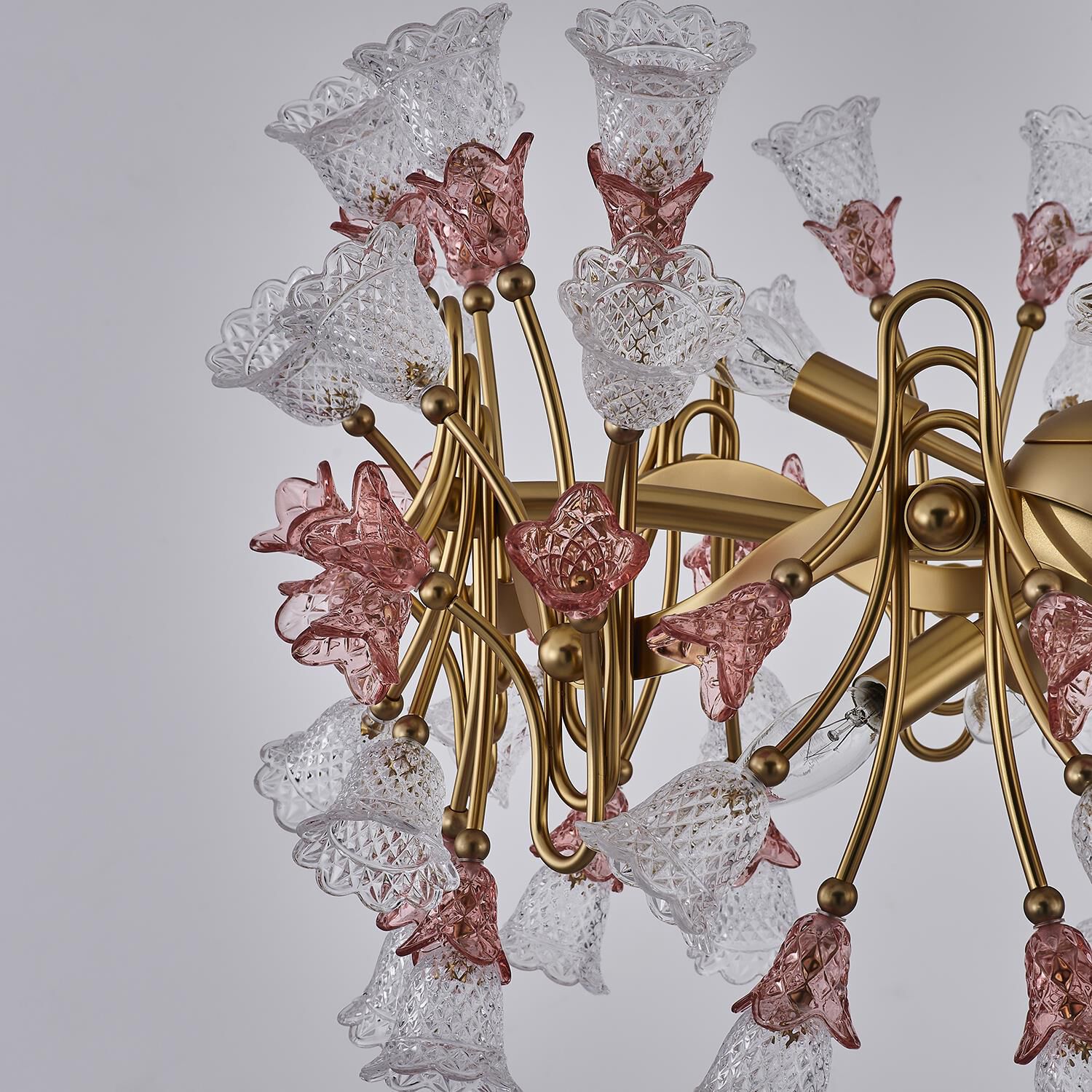 Shown in Antique Brass finish and Vintage Rose crystal