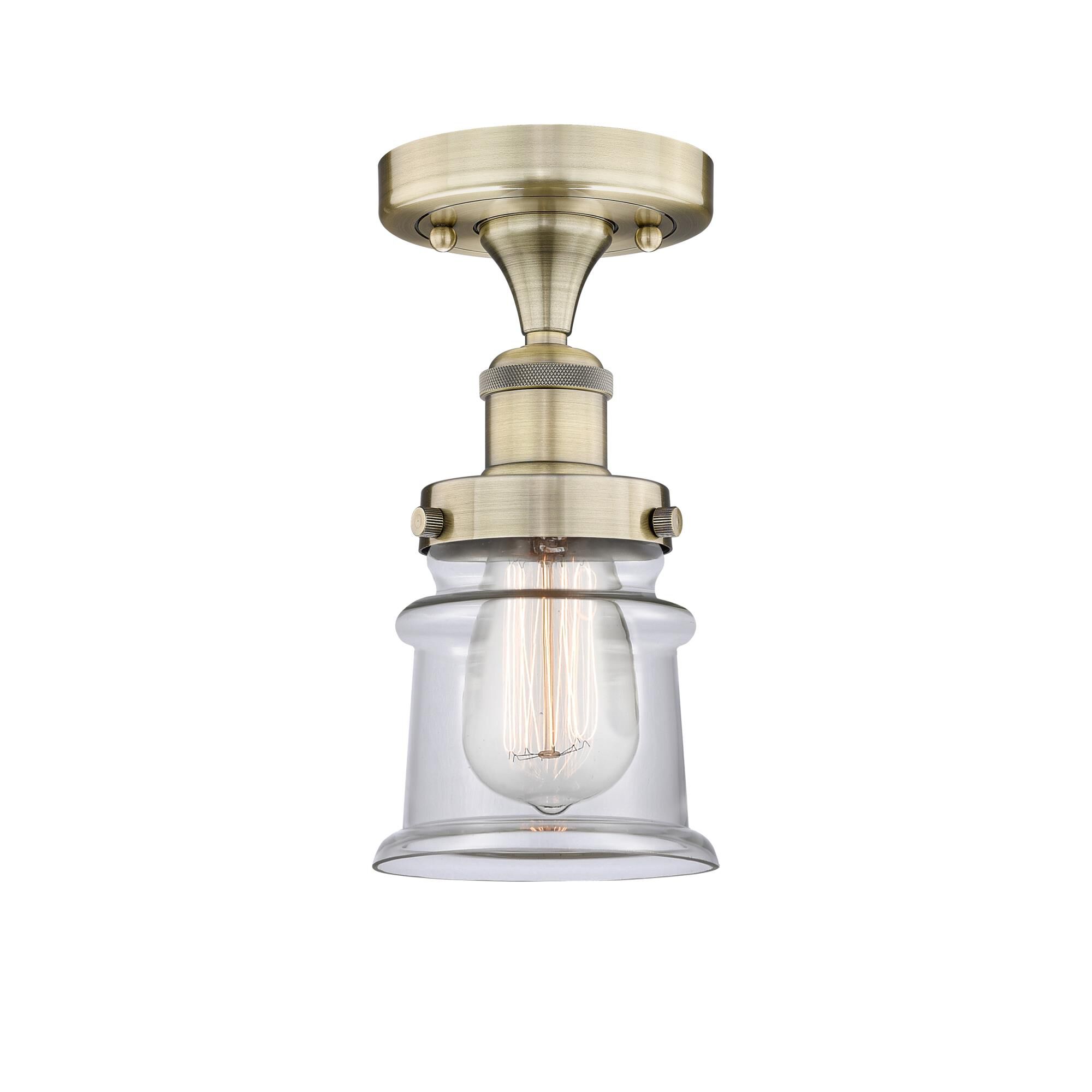 Shown in Antique Brass finish and Clear glass
