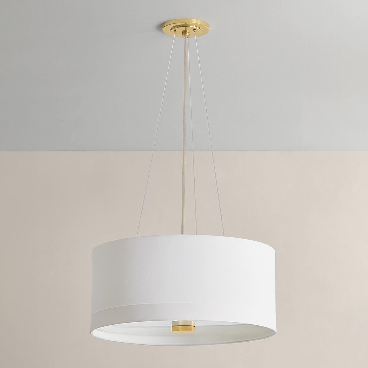 Shown in Aged Brass finish and White Linen shade