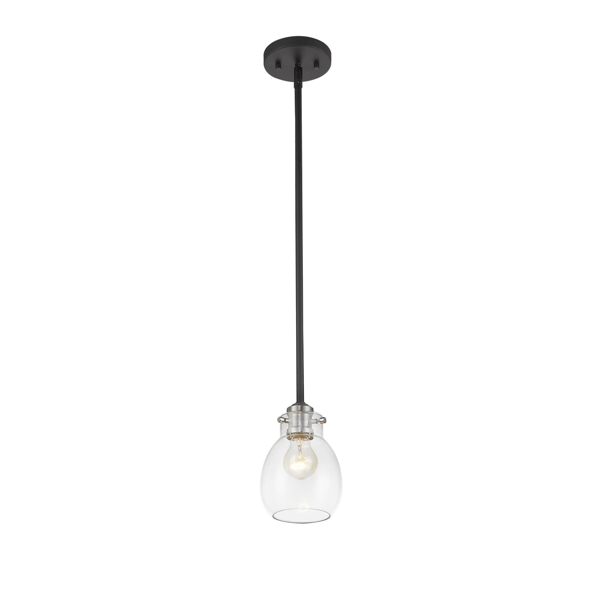 Shown in Matte Black + Brushed Nickel finish and Glass shade
